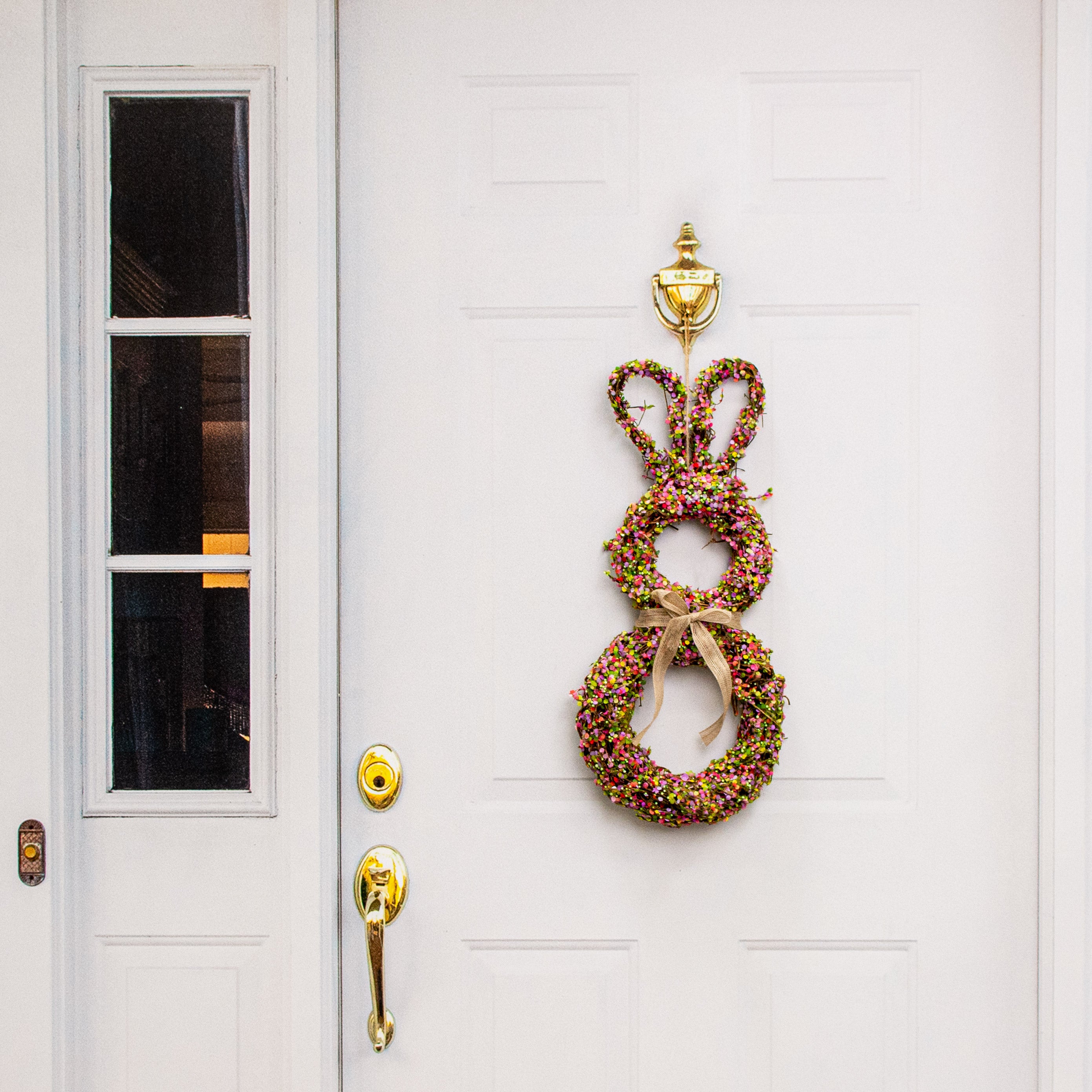 24" Floral Rattan Rabbit Door Hanger Lifestyle Photo