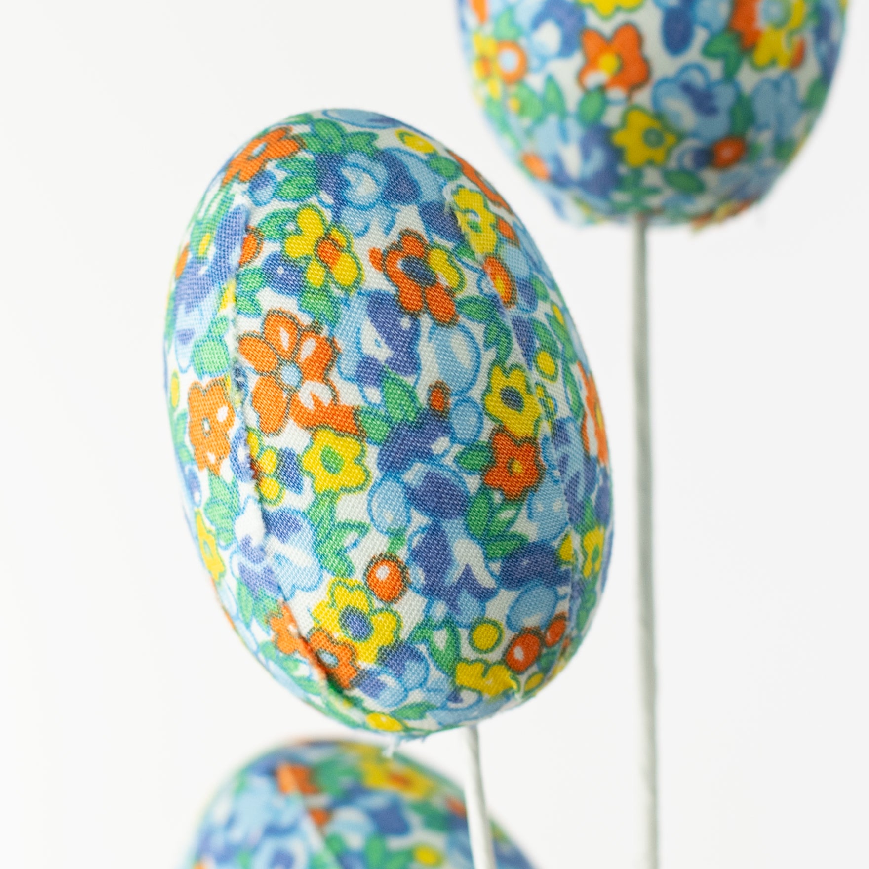12" Flower Pattern Easter Egg Pick: Blue & Orange Lifestyle Photo