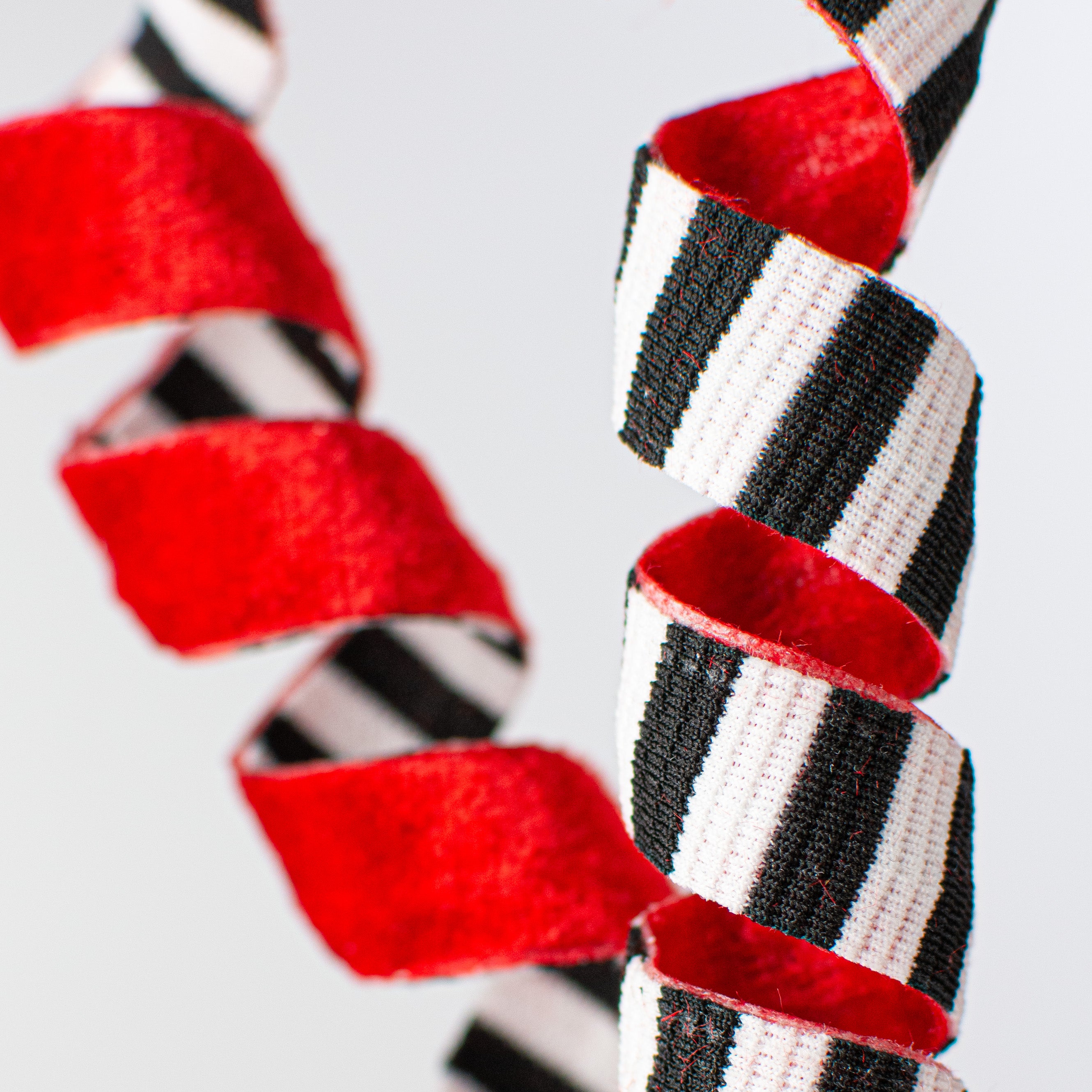 16" Double Sided Frizzy Curly Pick: Zebra & Red Lifestyle Photo