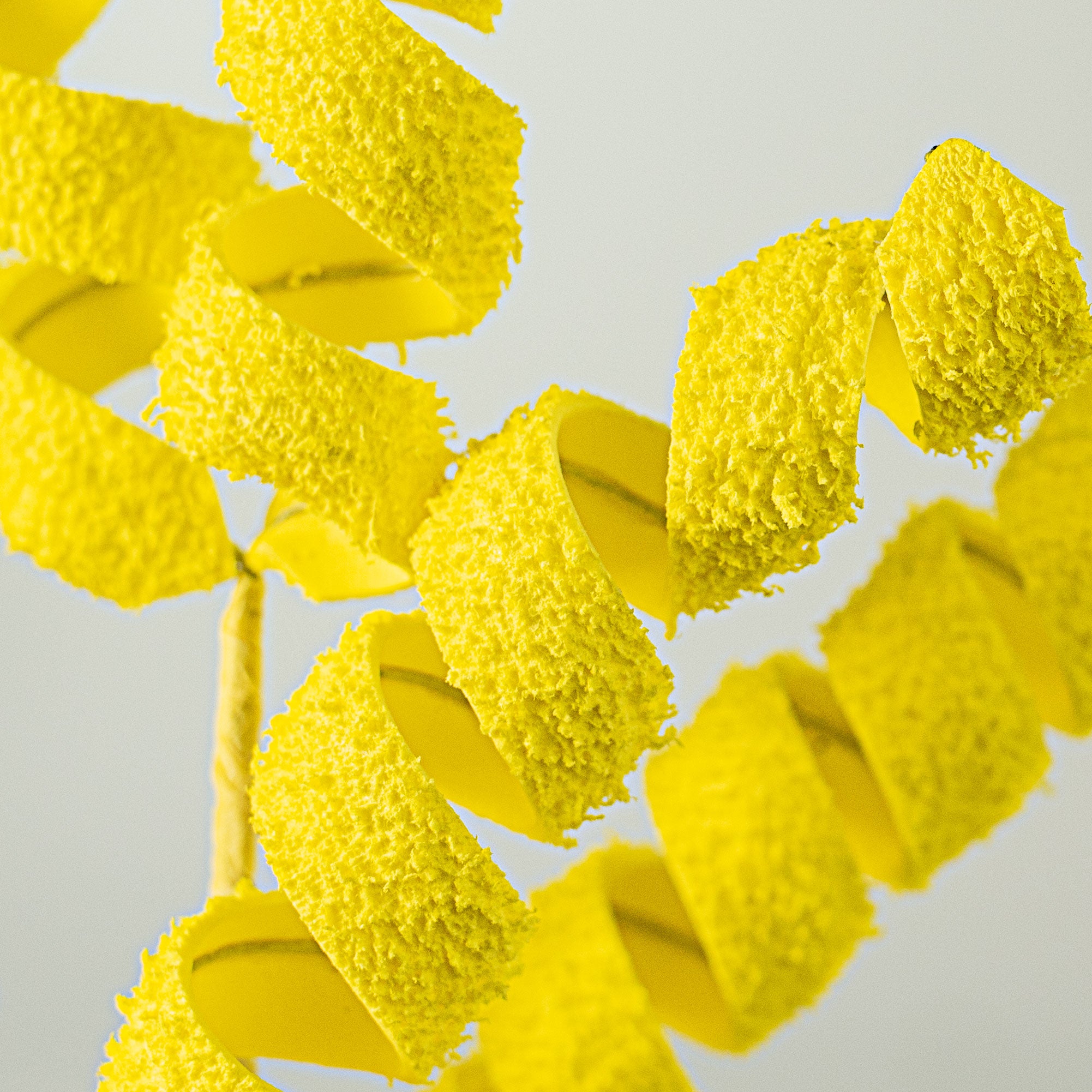 16" Frizzy Fuzzy Curly Pick: Yellow Lifestyle Photo