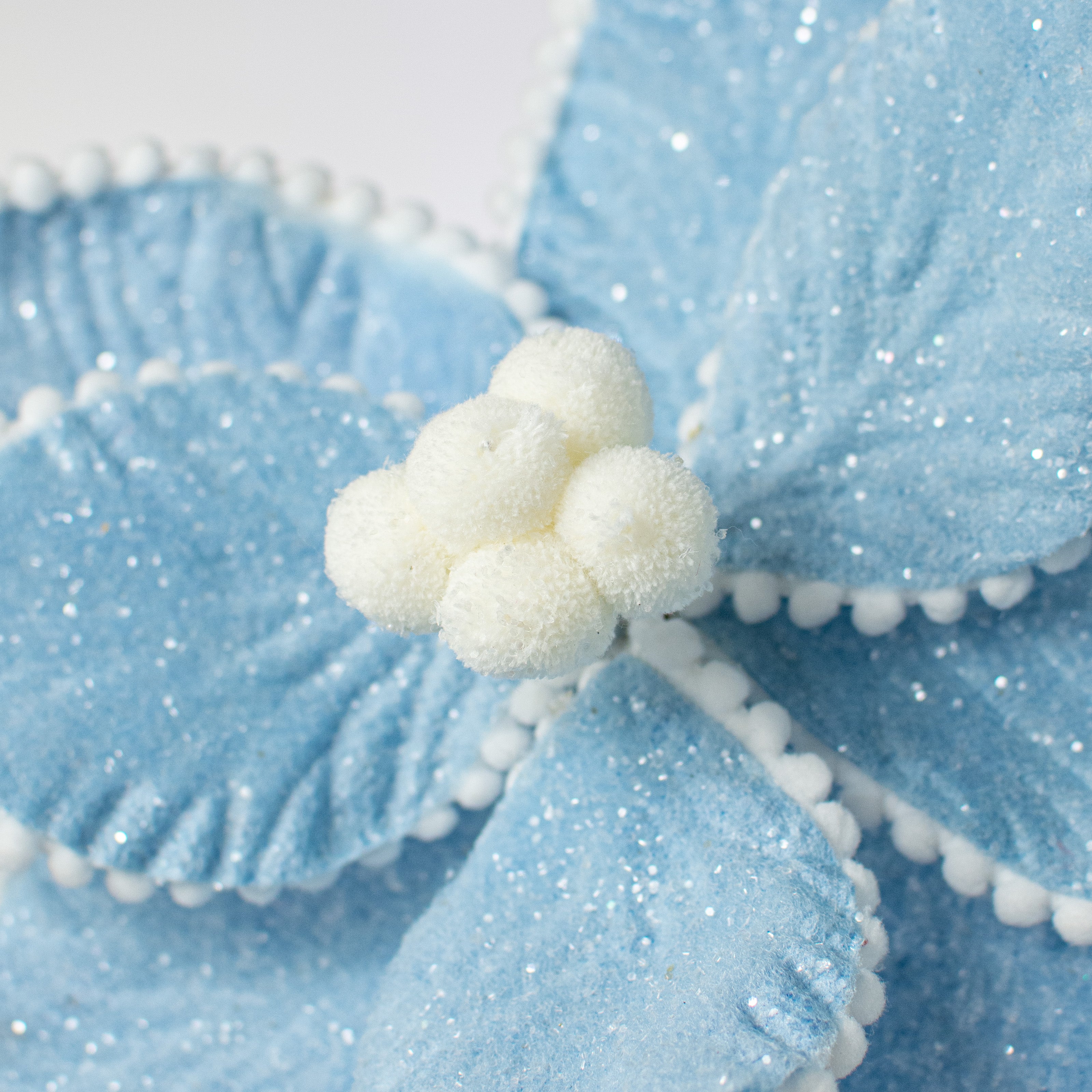 13" Frosted Poinsettia Pick: Blue & White Lifestyle Photo