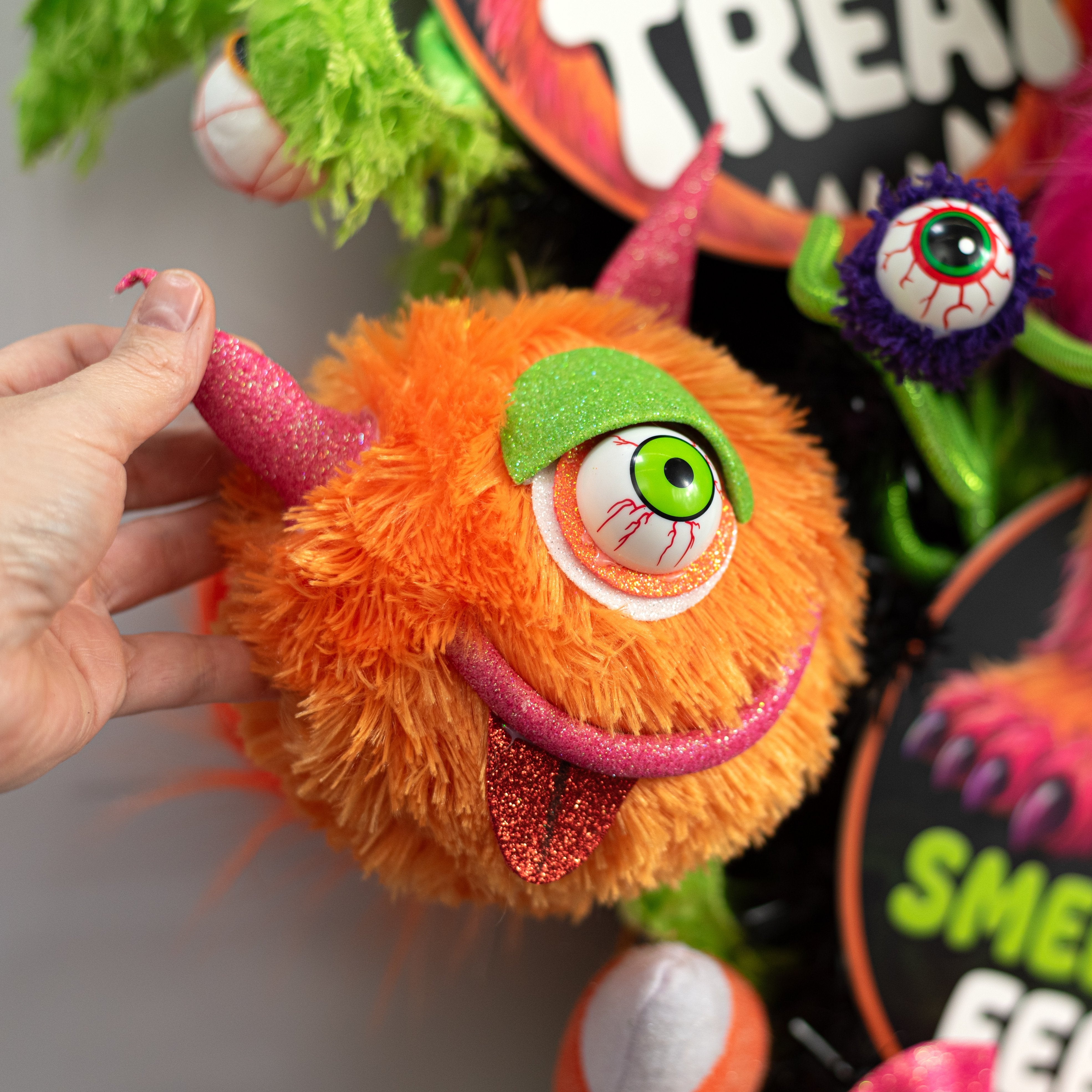 7" Furry Eyeball Monster Ornament: Orange Lifestyle Photo