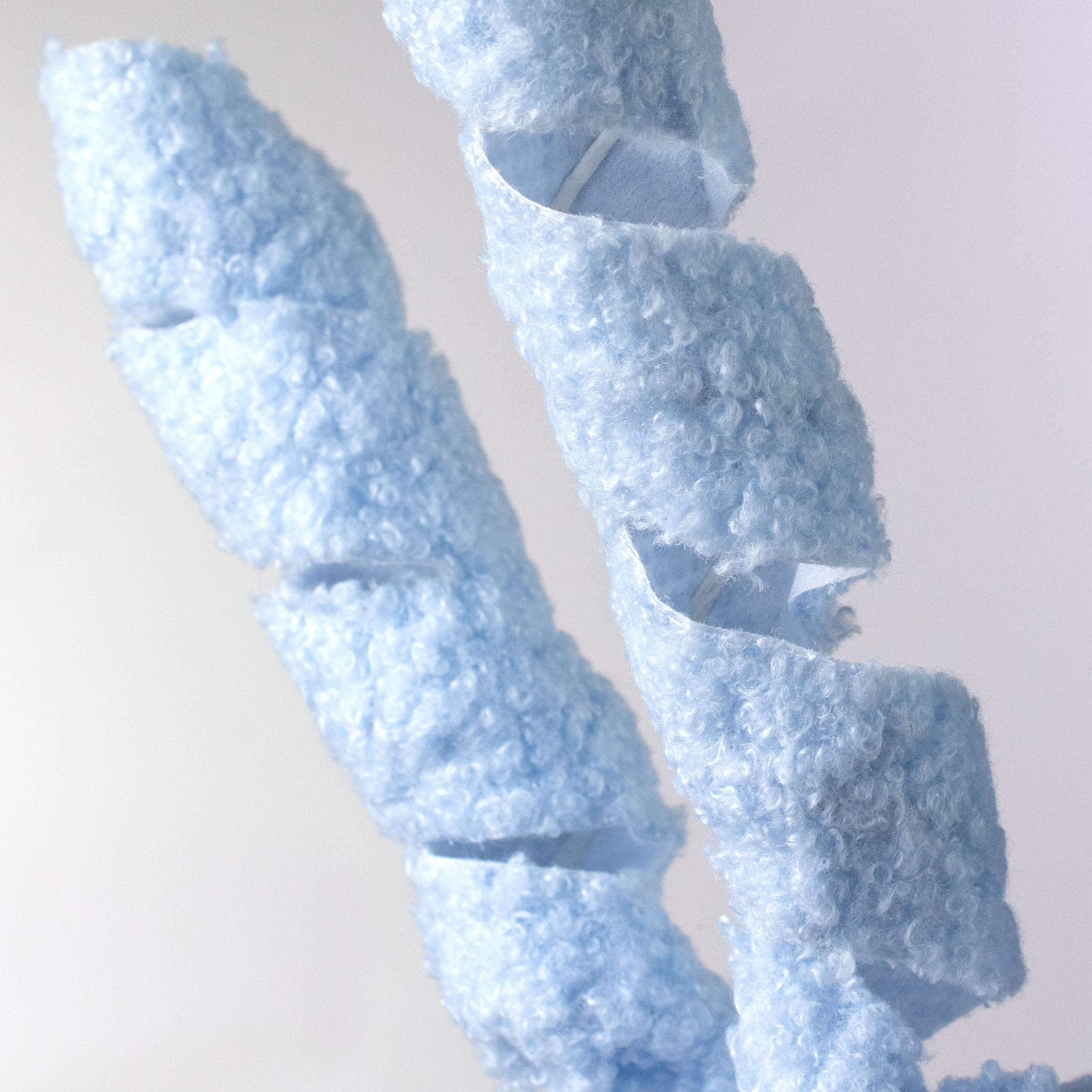 19" Fuzzy Fabric Ribbon Curls Spray: Blue Lifestyle Photo