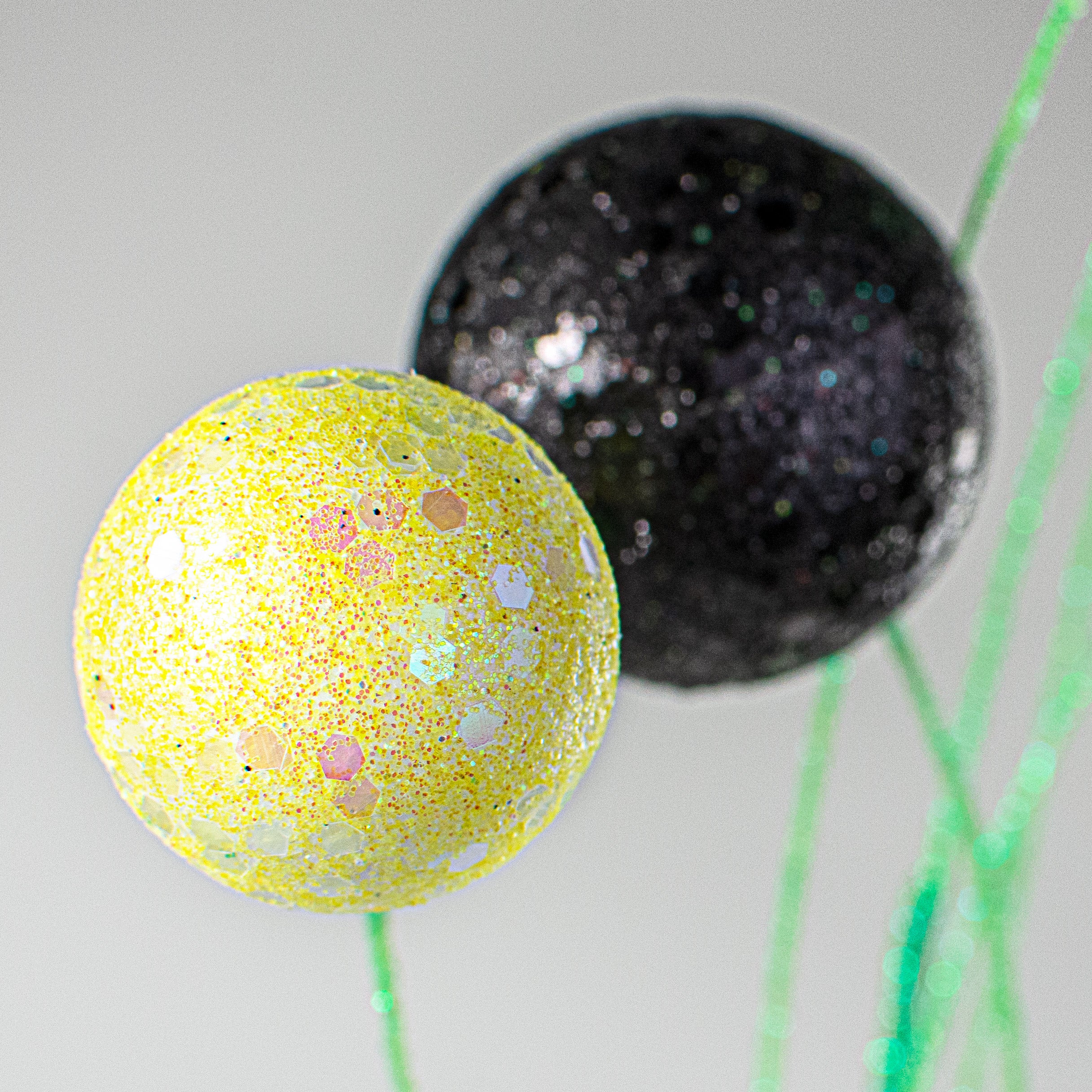 30" Glitter Ball Filler Spray: Yellow & Black Lifestyle Photo