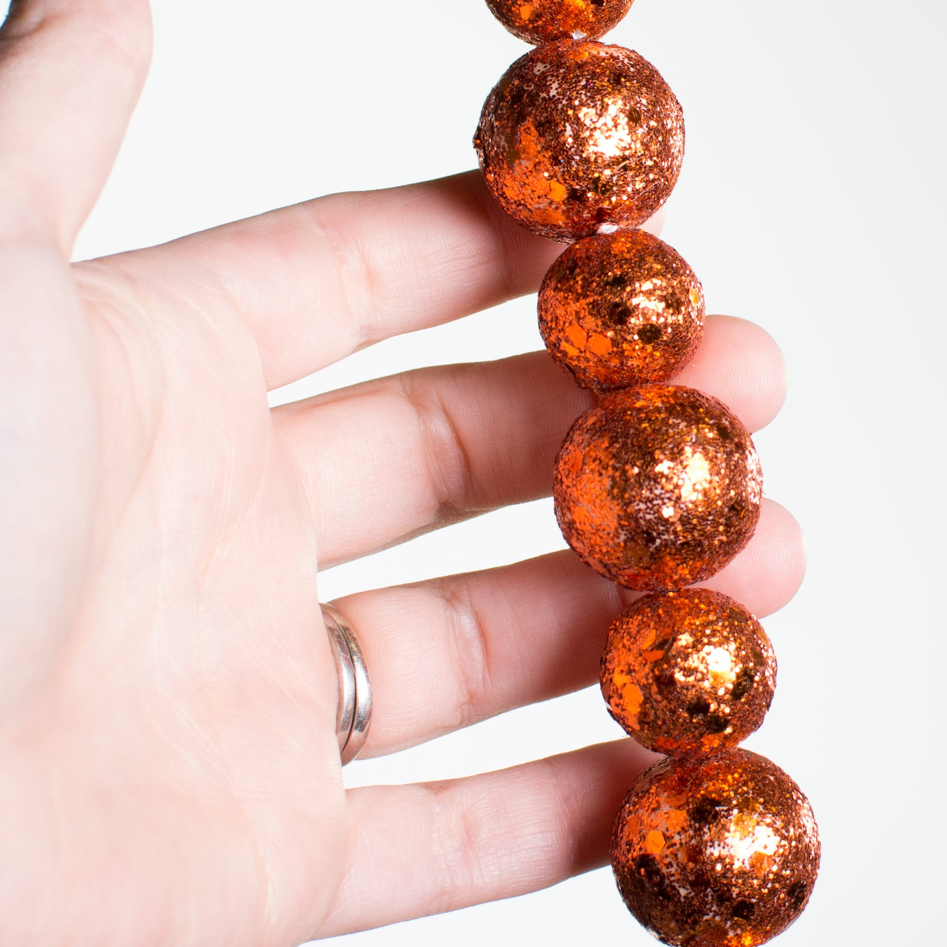 6' Glitter Ball Garland: Orange Lifestyle Photo