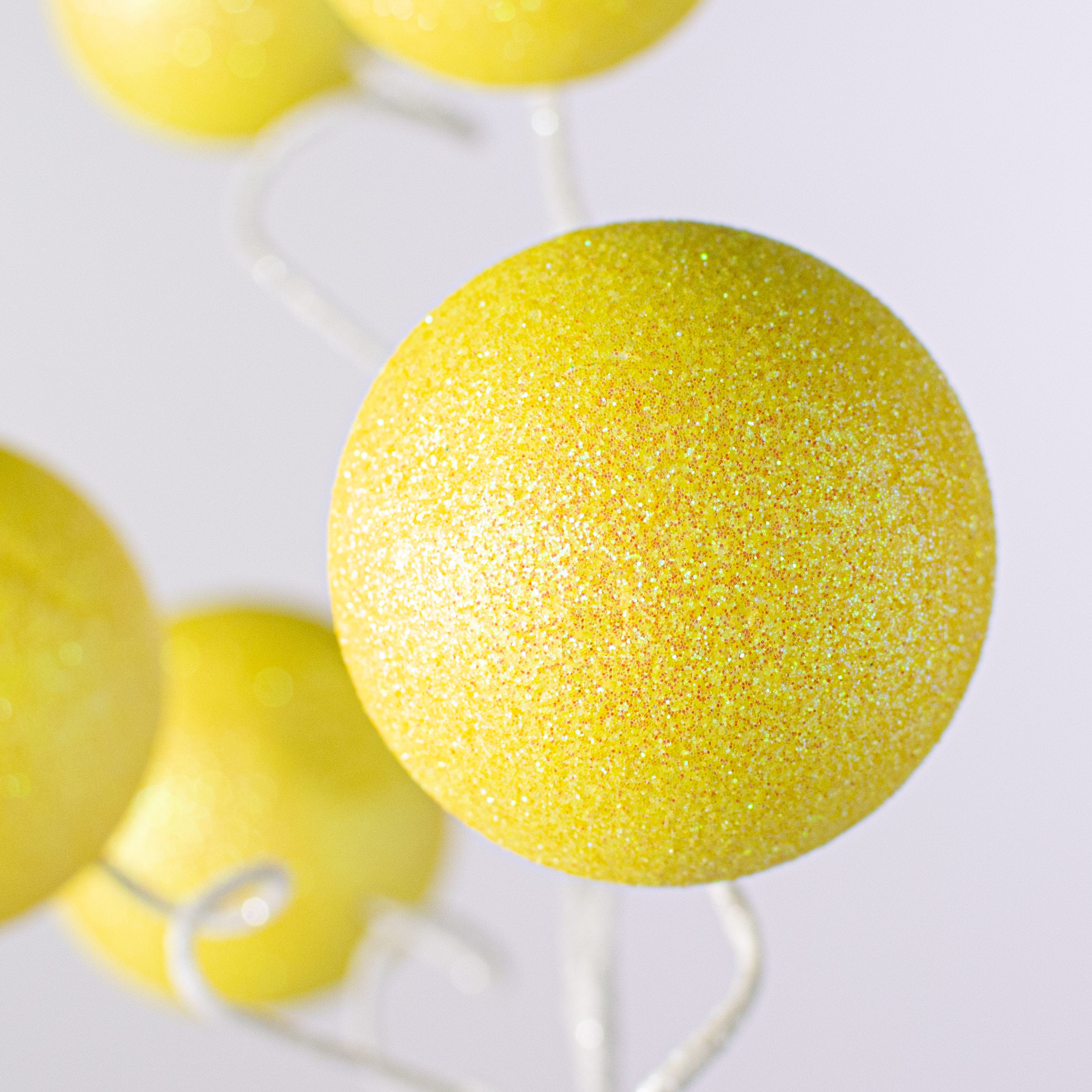 19" Glitter Ball Spray: Yellow Lifestyle Photo