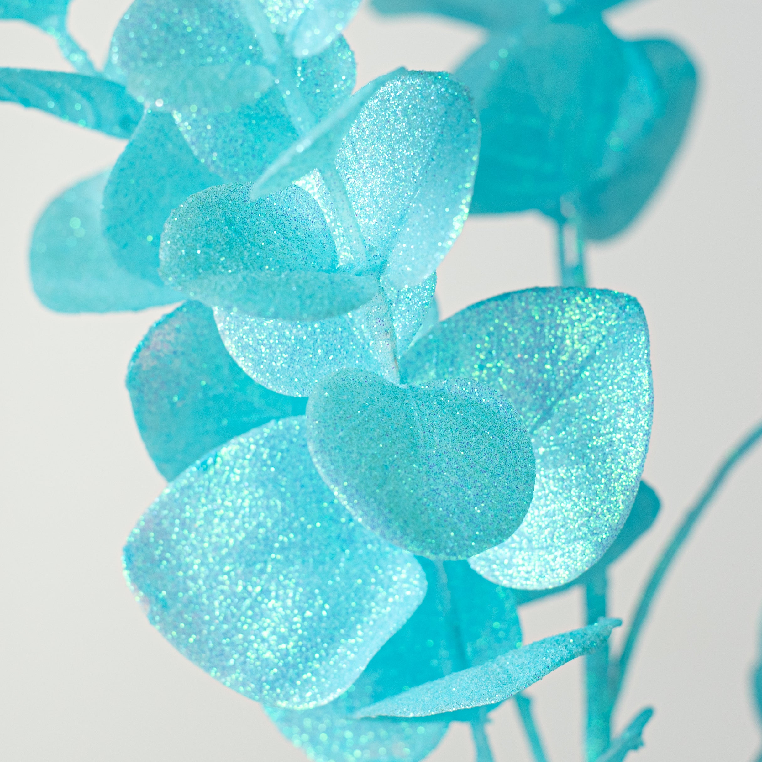 24" Glitter Eucalyptus Spray: Iridescent Ice Blue Lifestyle Photo