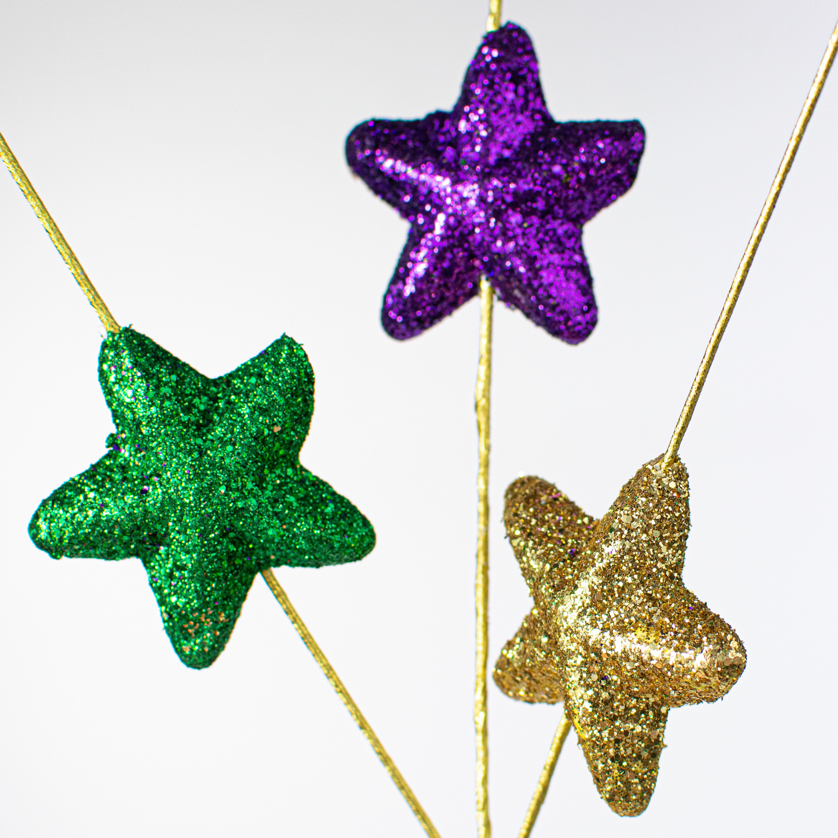 31" Glitter Star Spray: Purple, Green, Gold Lifestyle Photo