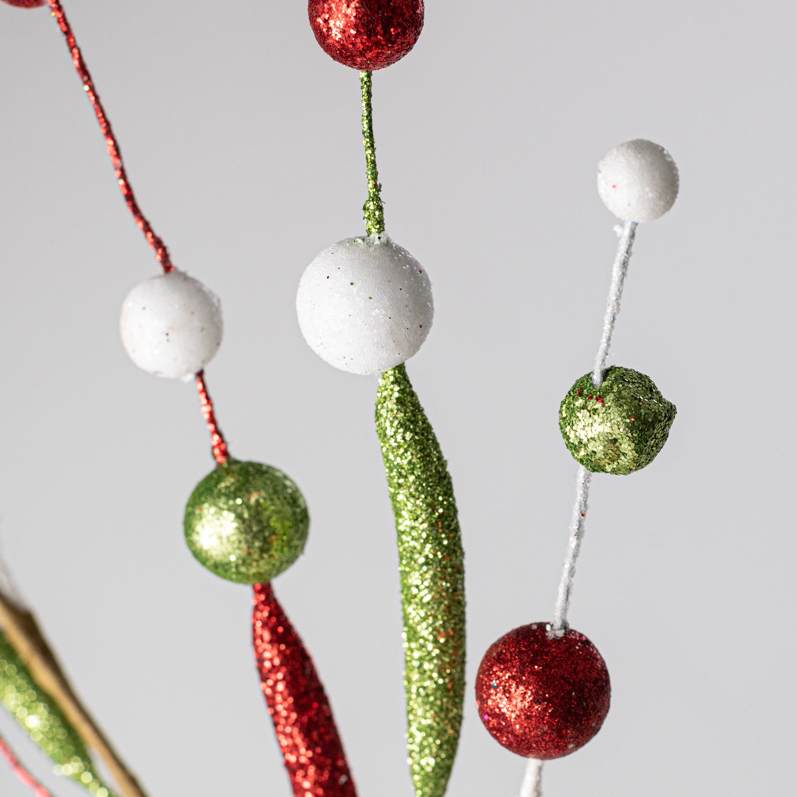 25" Glitter Tubing Ball Spray: Red, Lime Green & White Lifestyle Photo