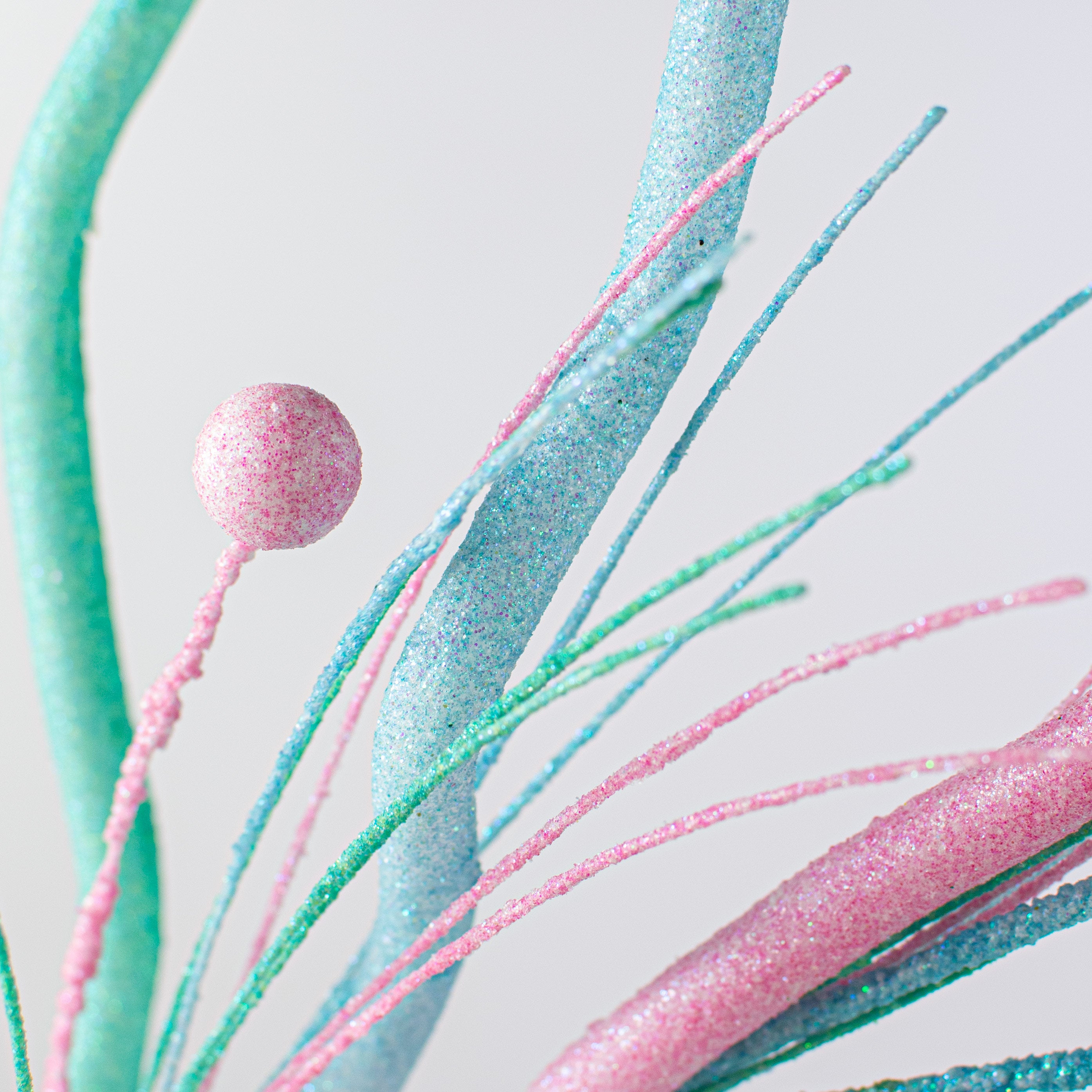 36" Glitter Twig Fishline Ball Spray: Iridescent Turquoise, Light Pink, Light Blue Lifestyle Photo