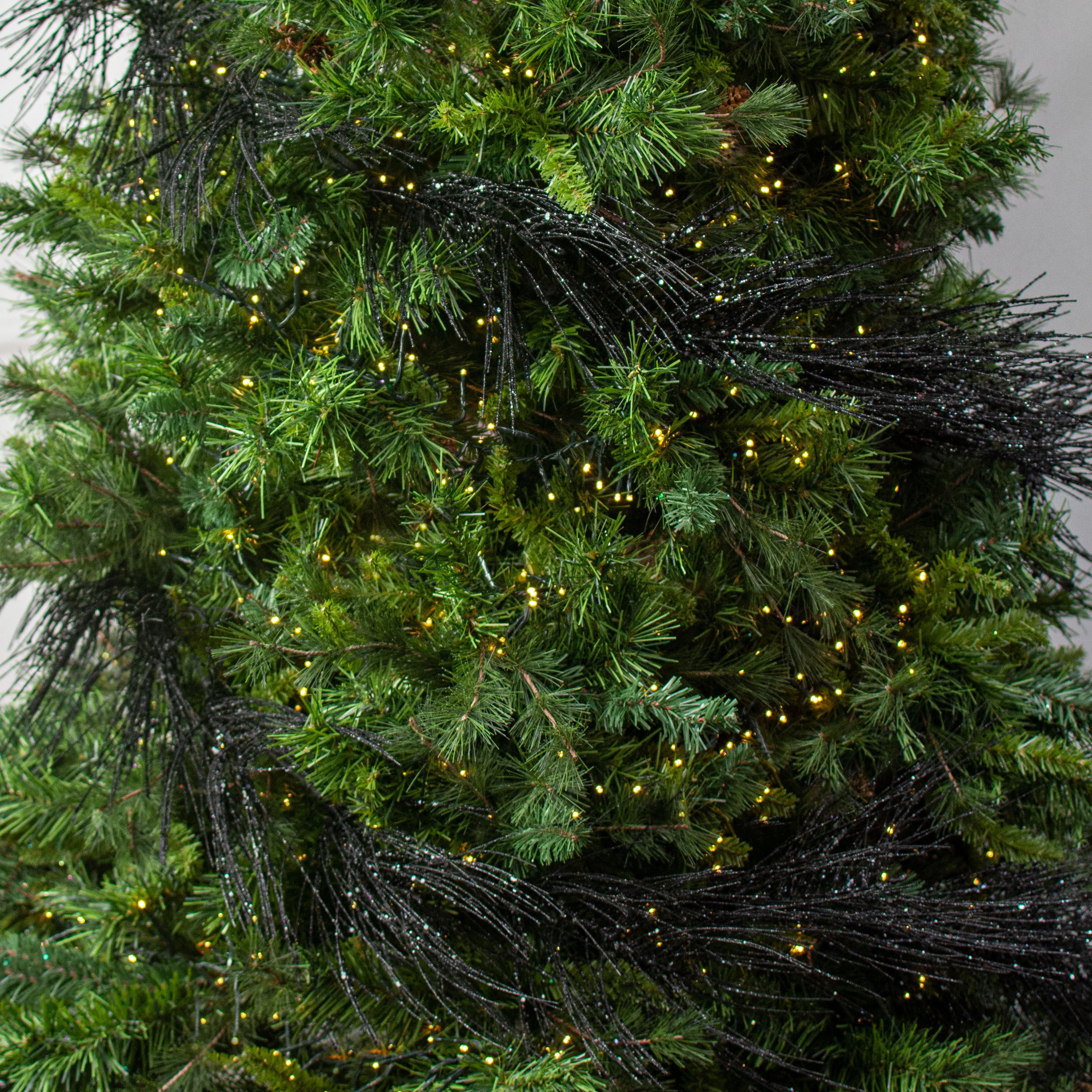 5' Glittered Pine Garland: Black Lifestyle Photo