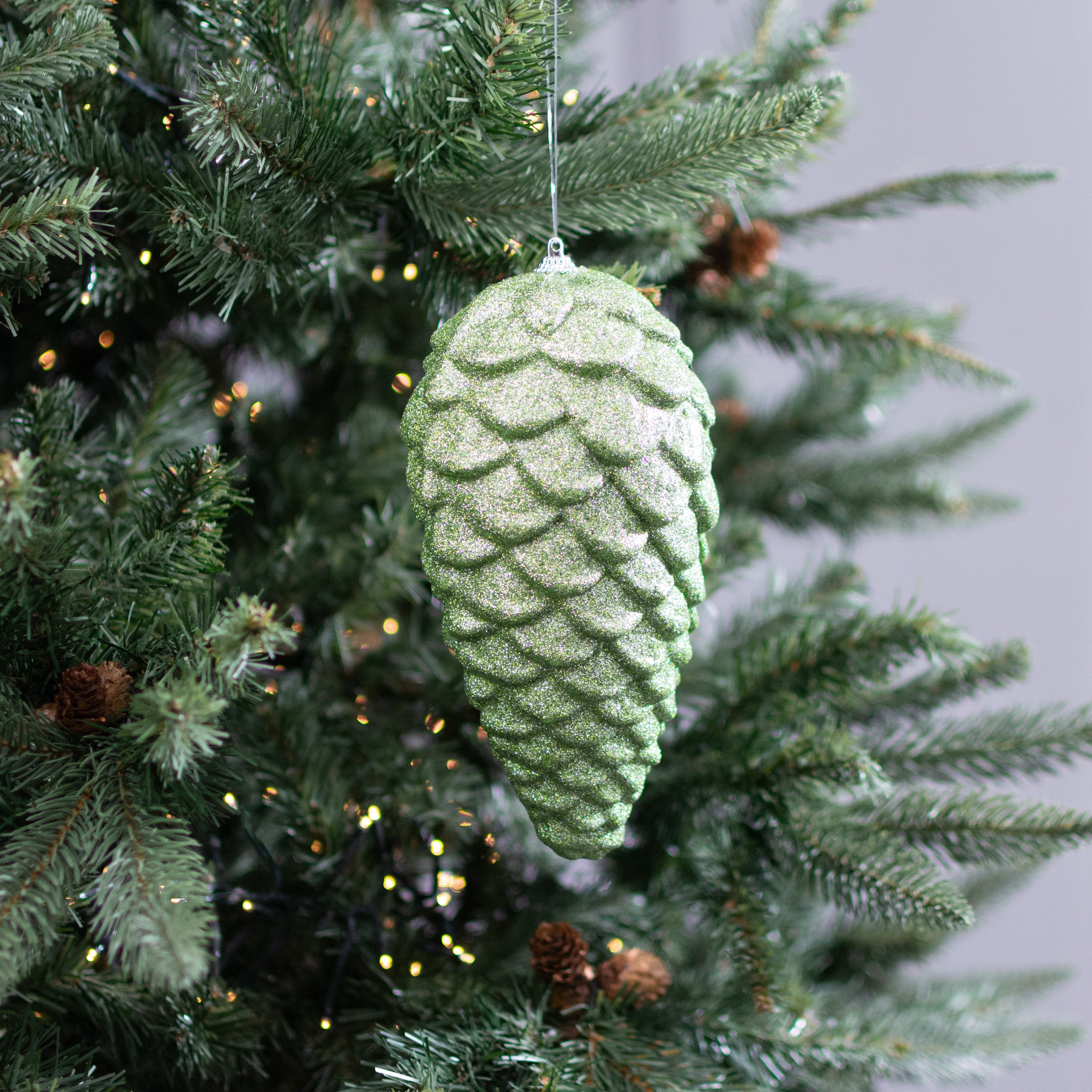 9" Glittered Pinecone Ornament: Sage Green Lifestyle Photo