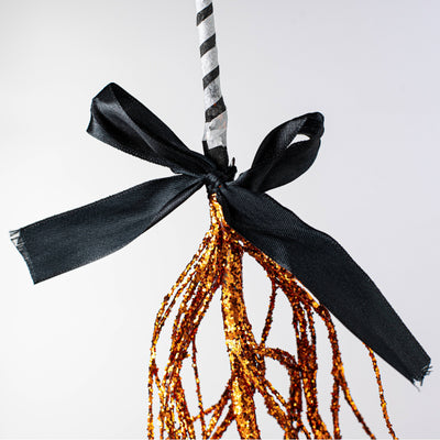 26" Glittered Twig Witch Broom: Orange Lifestyle Photo