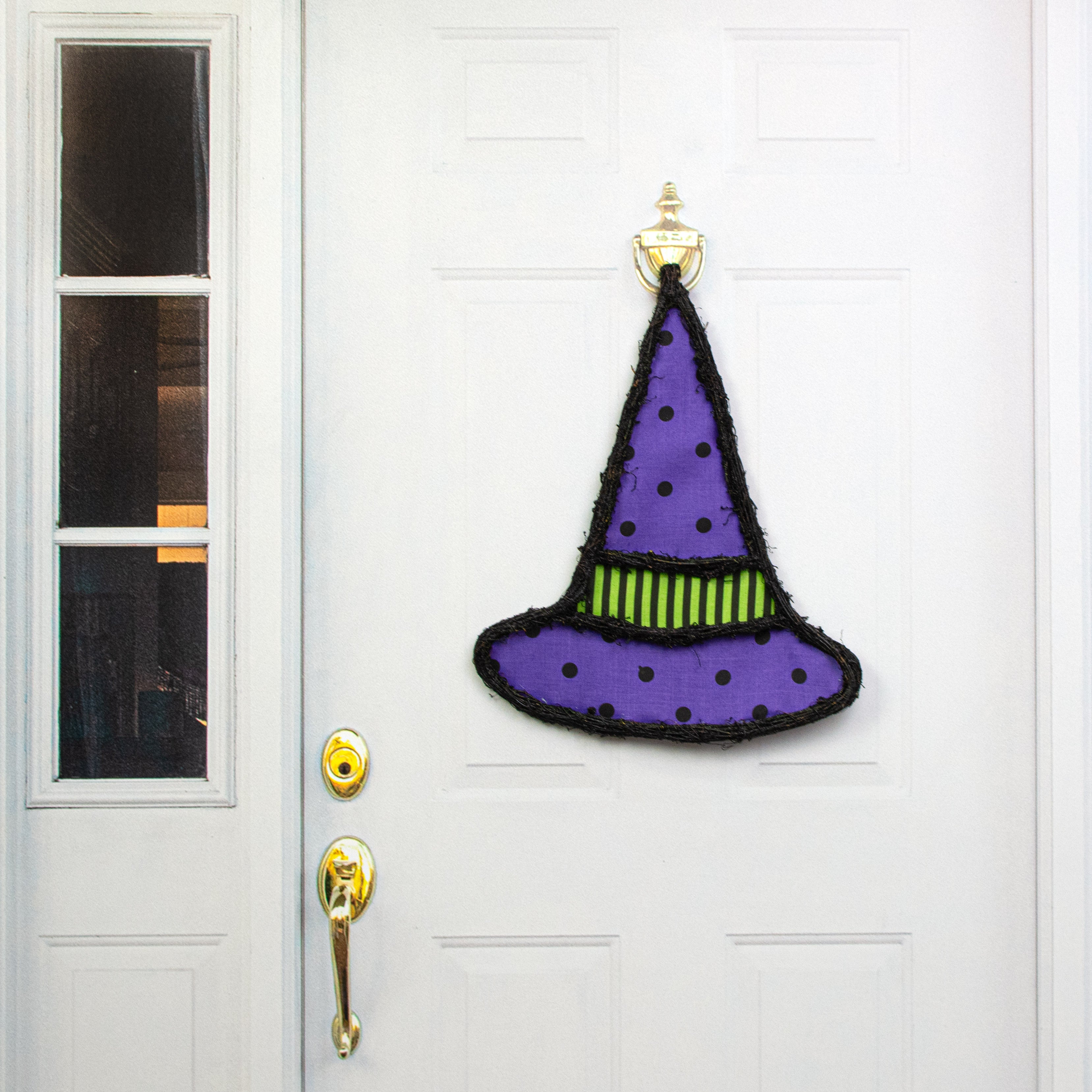 21" Grapevine Hanger: Purple Polka Dot Witch Hat Lifestyle Photo