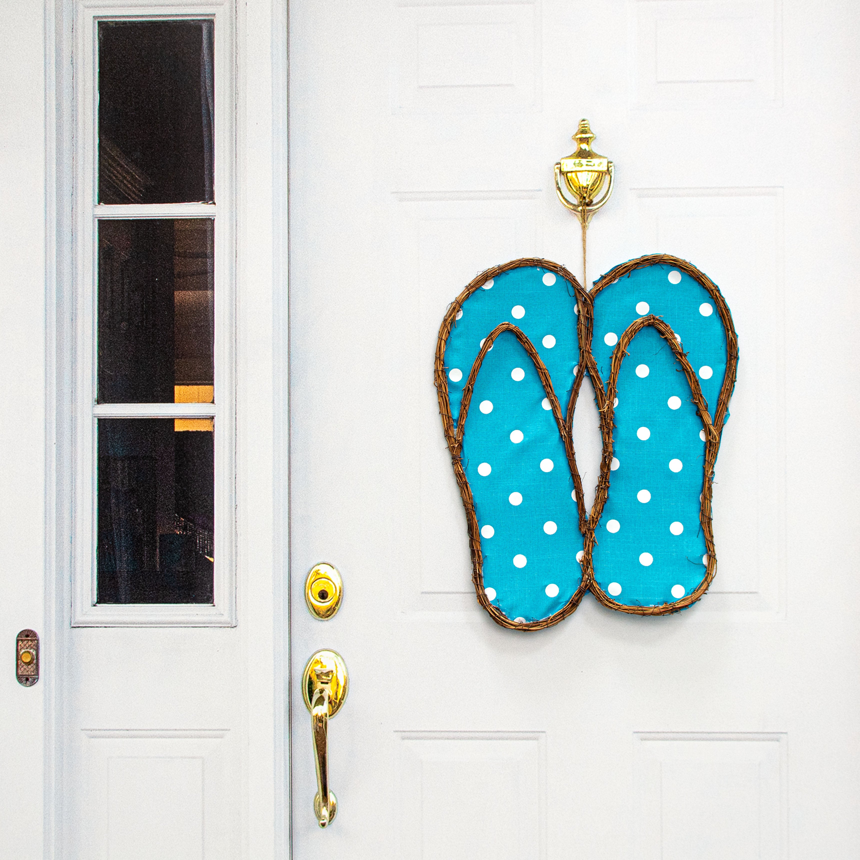 22" Grapevine Hanger: Turquoise Polka Dot Flip Flops Lifestyle Photo