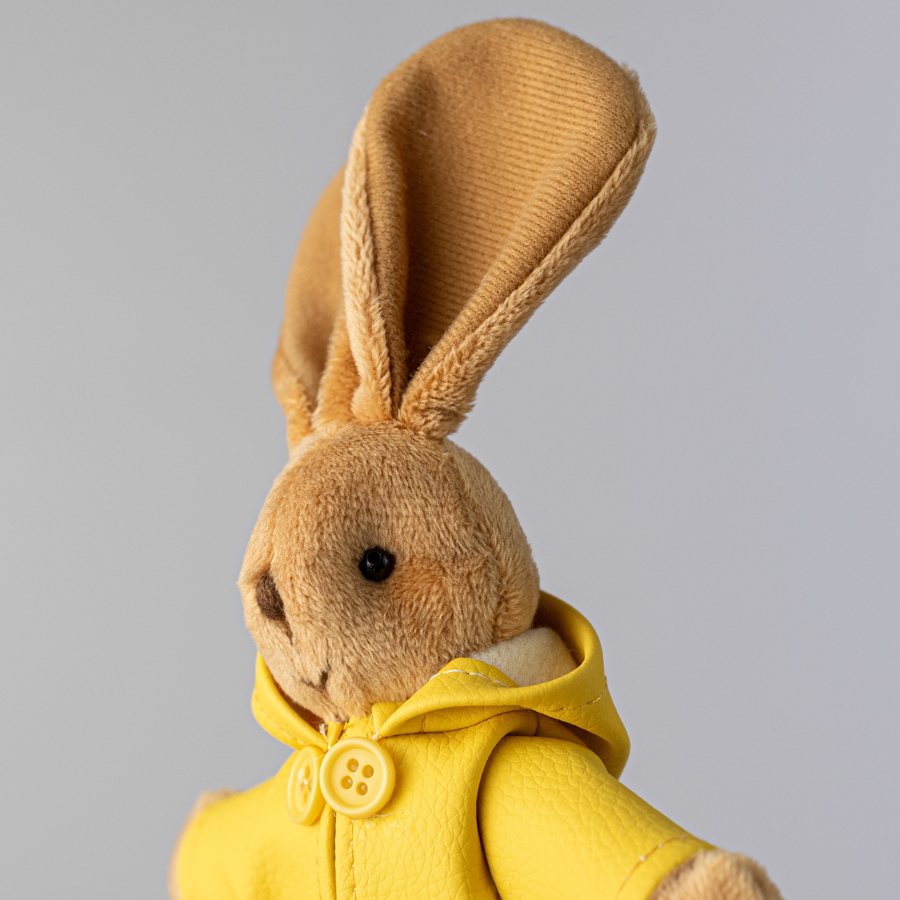 9" Rain Coat Bunny Decor: Yellow