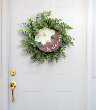 12" Round Metal Sign: Welcome Magnolia Flower