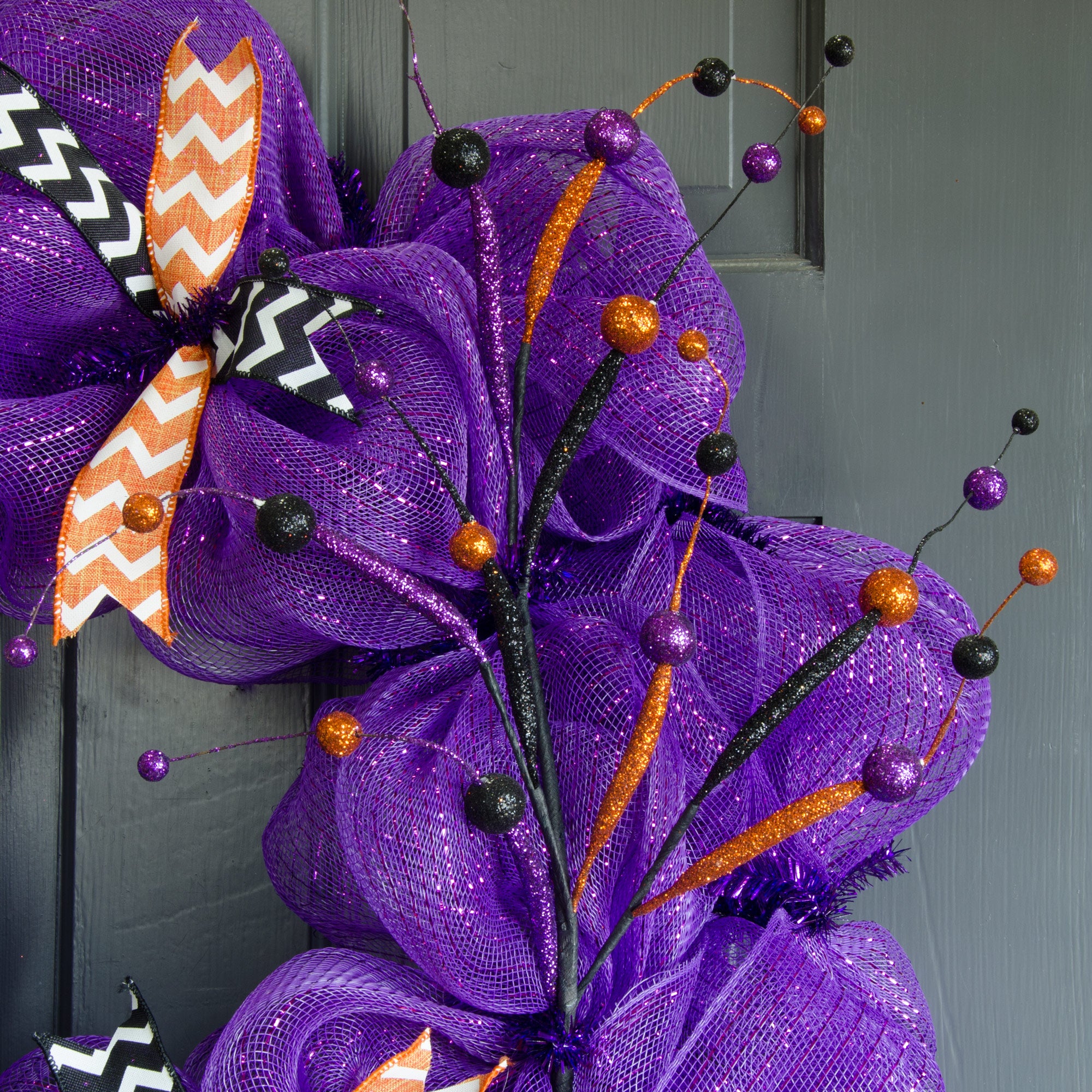 25" Glitter Tubing Ball Spray: Purple, Orange & Black