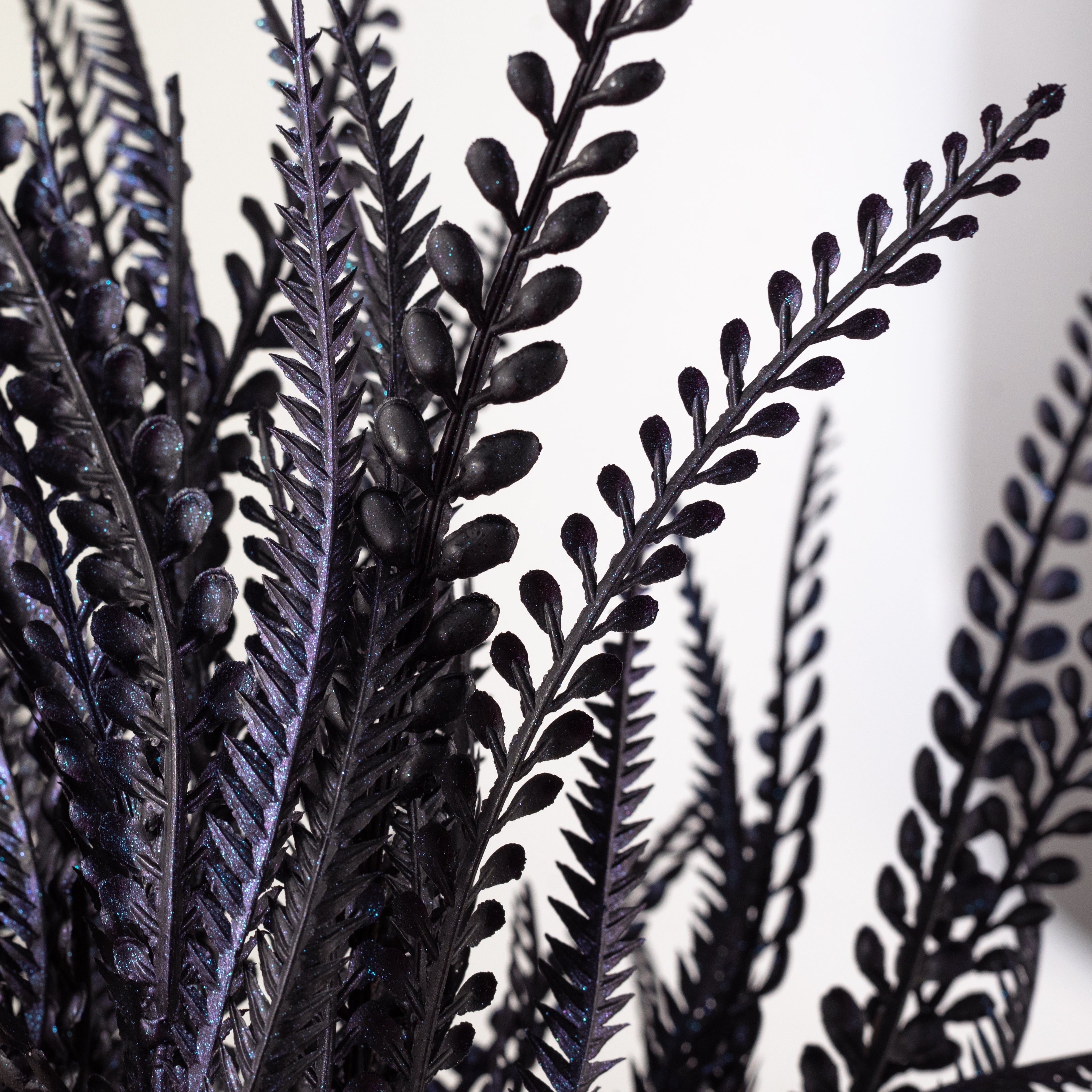 20" Plastic Leaf Button Fern Bush: Black & Iridescent Purple