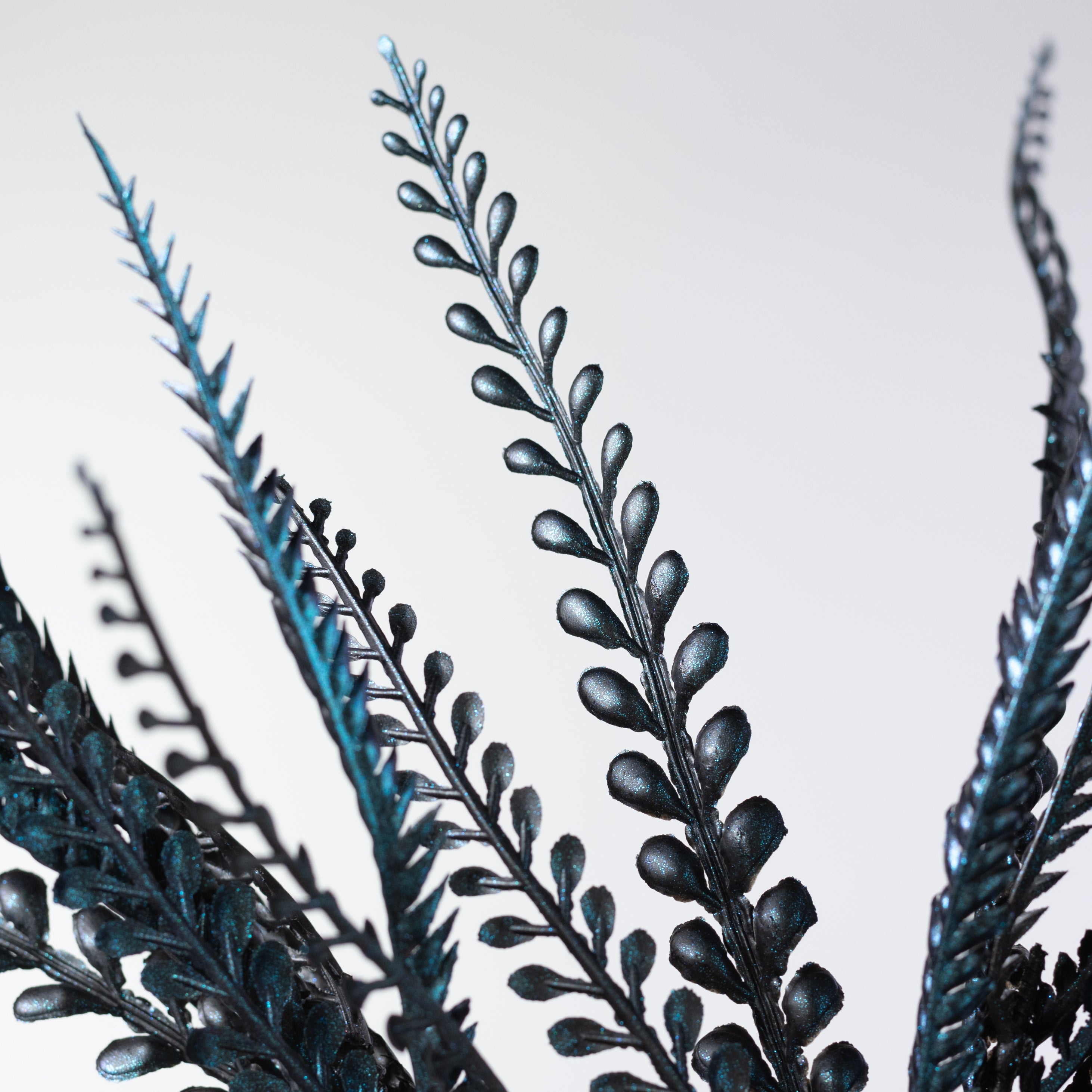 20" Plastic Leaf Button Fern Bush: Iridescent Blue on Black (7 Stem)