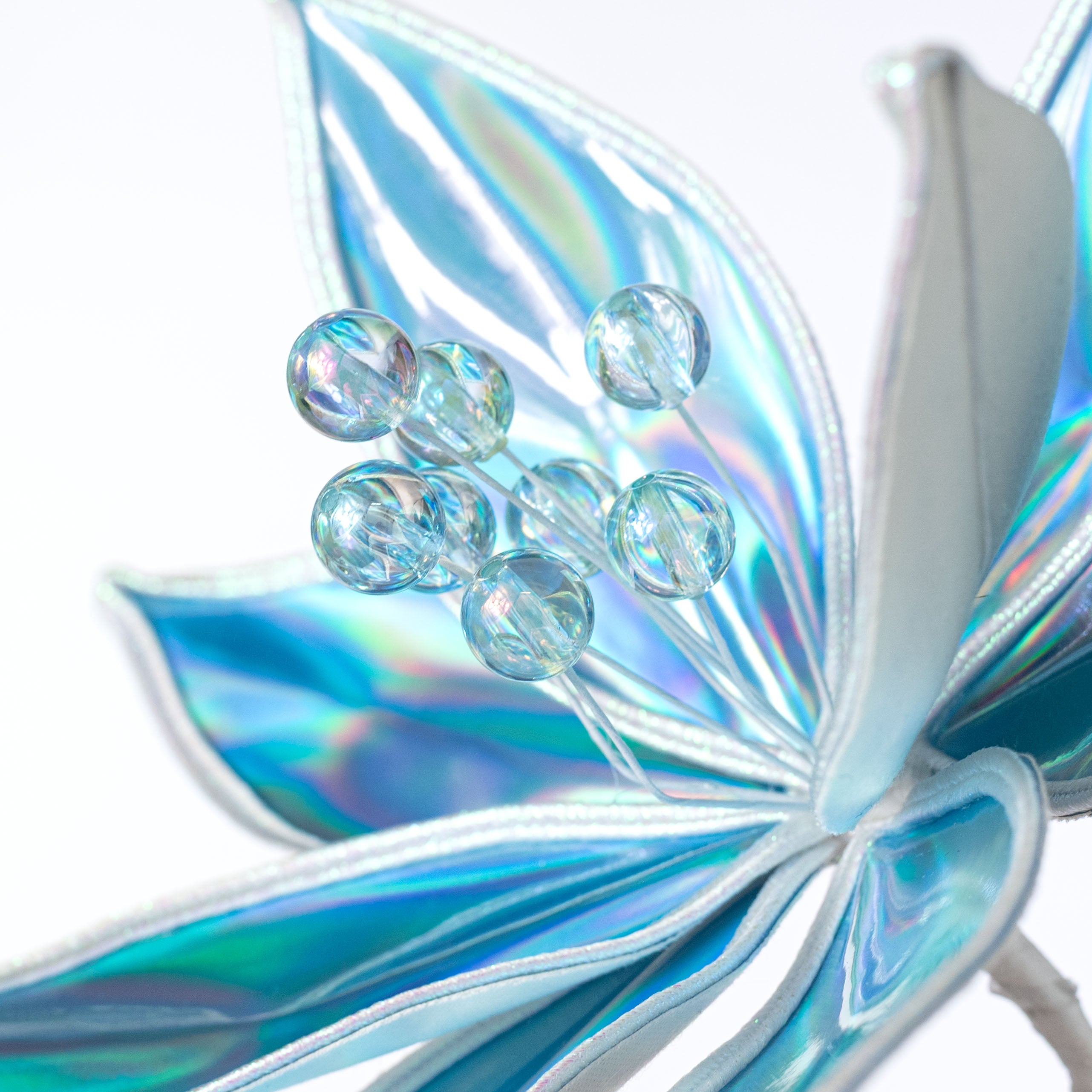 23" Lustrous Iridescent Poinsettia Stem: Blue