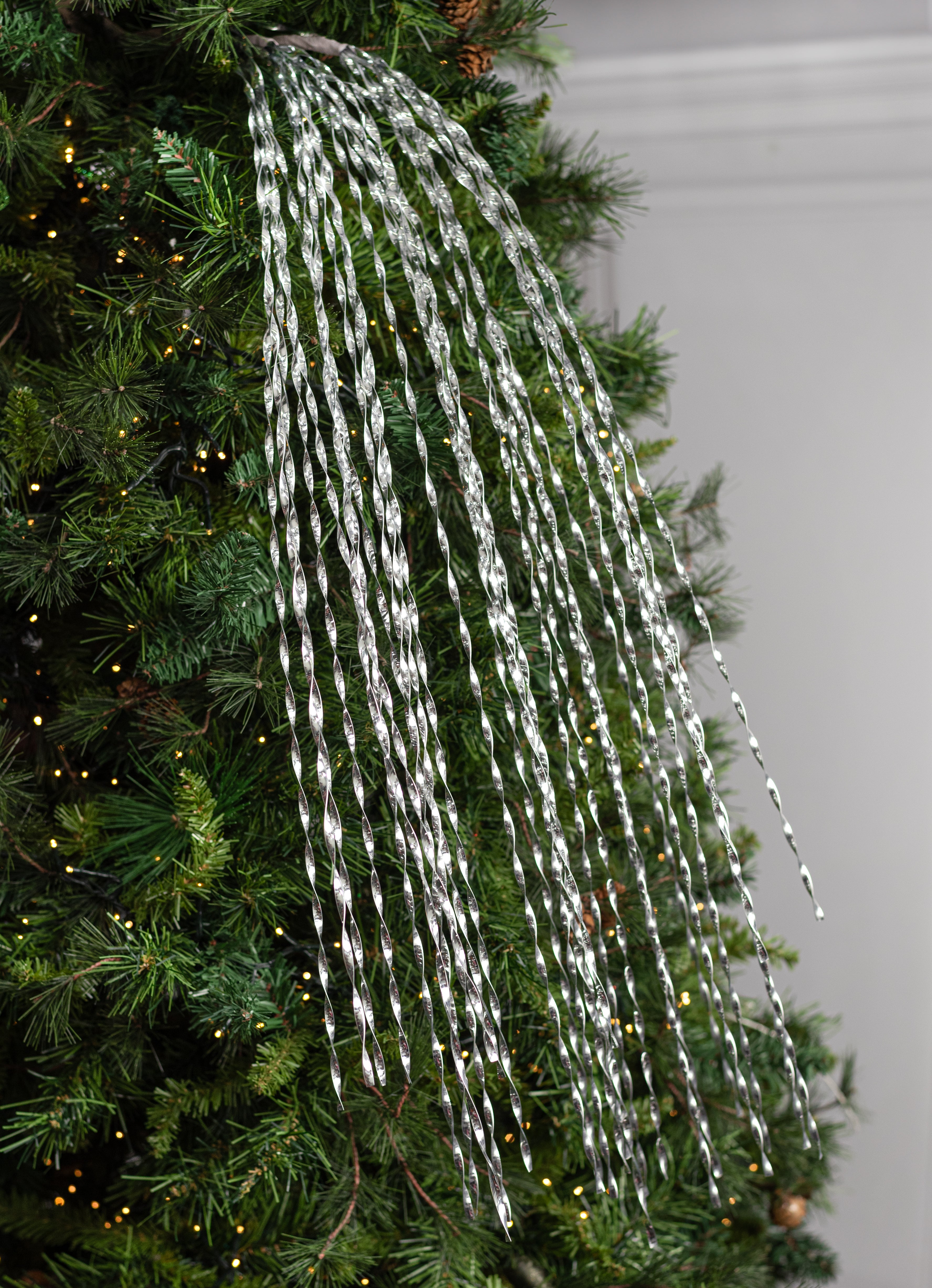 50" Spiraling Hanging Tinsel Spray: Metallic Silver