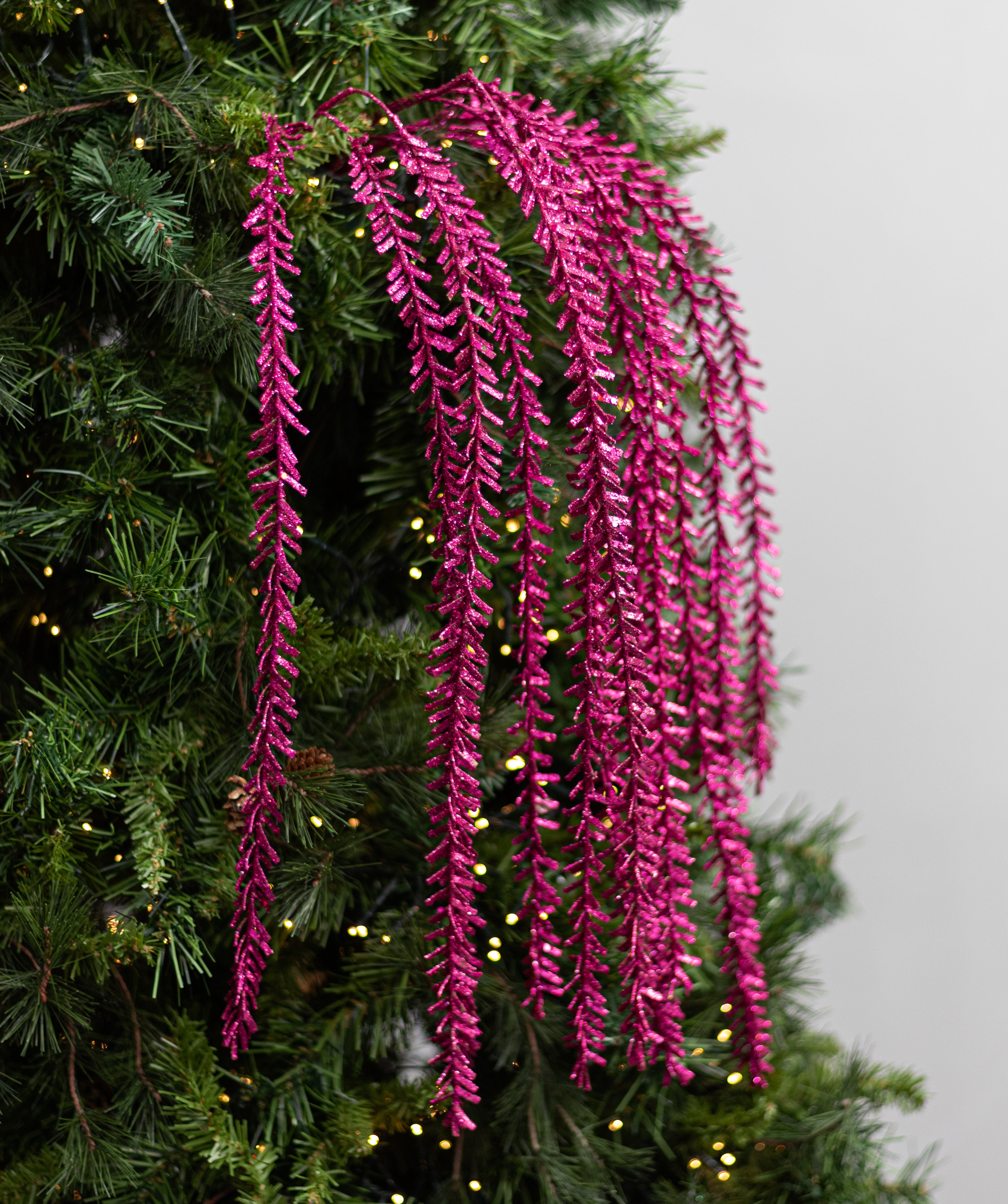 48" Glittered Pine Hanging Spray: Fuchsia Pink