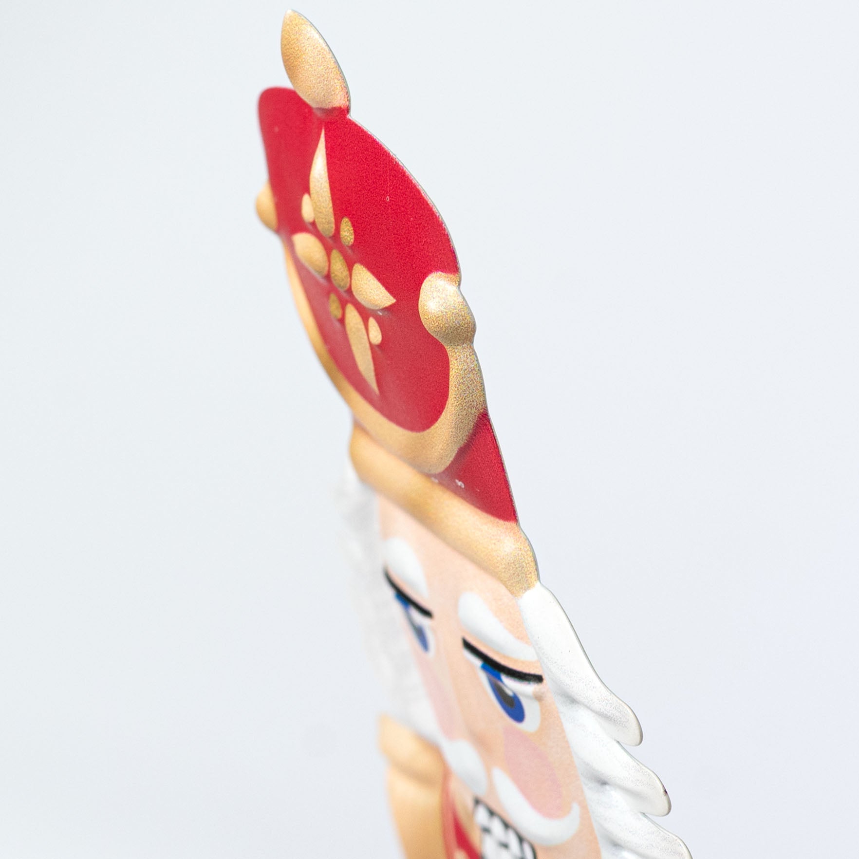 12" Metal Embossed Hanger: Light Traditional Nutcracker