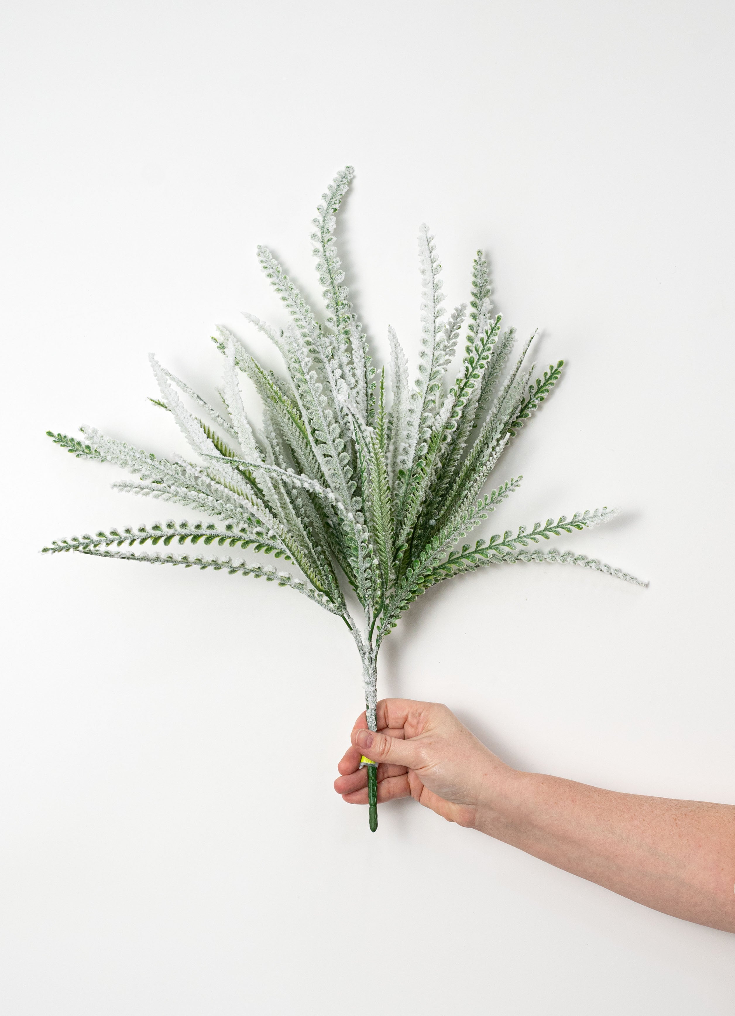 20" Plastic Leaf Button Fern Bush: Flocked Snow Green (7 Stem)
