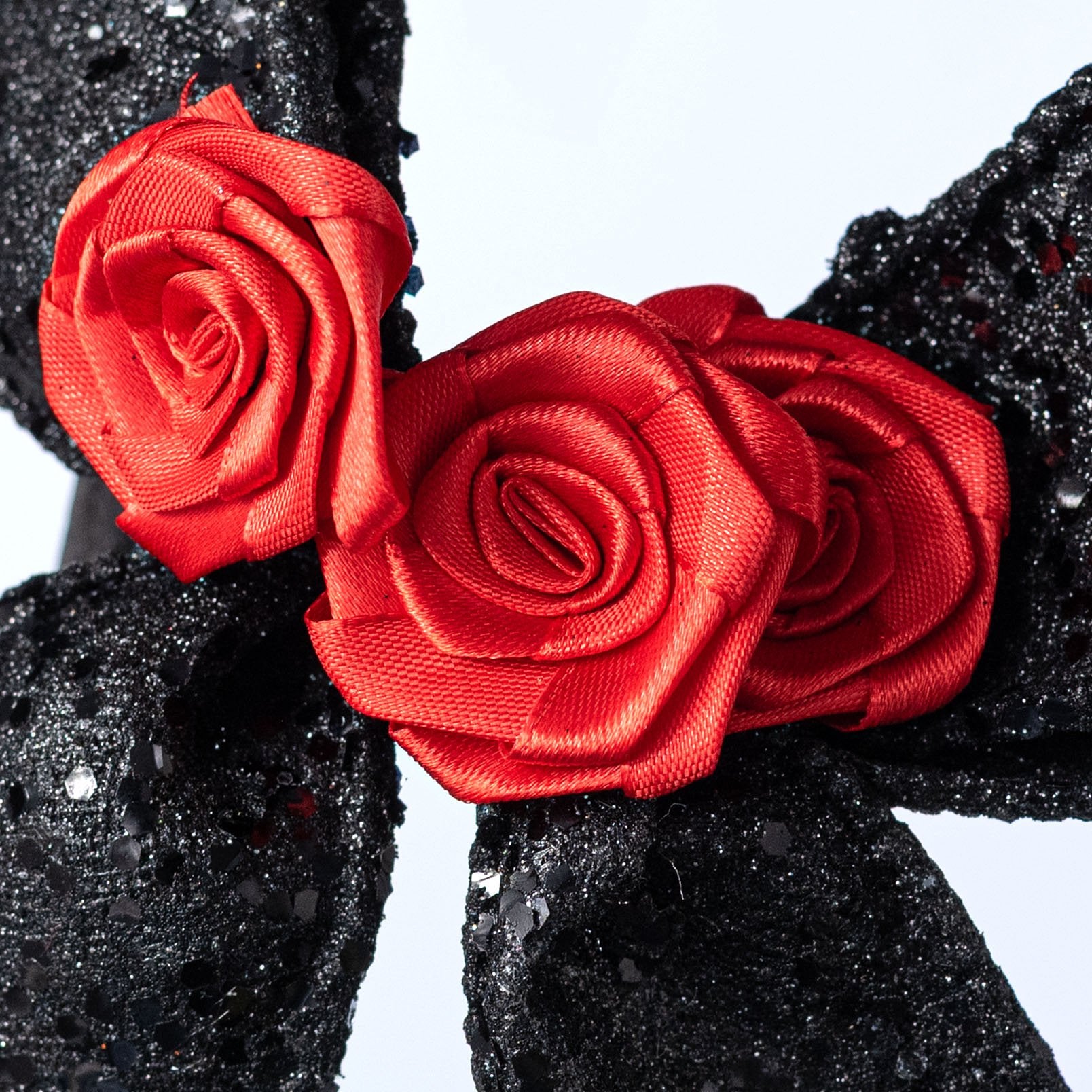 [IMPERFECT] 26" Rose Bow Spray: Black & Red Lifestyle Photo