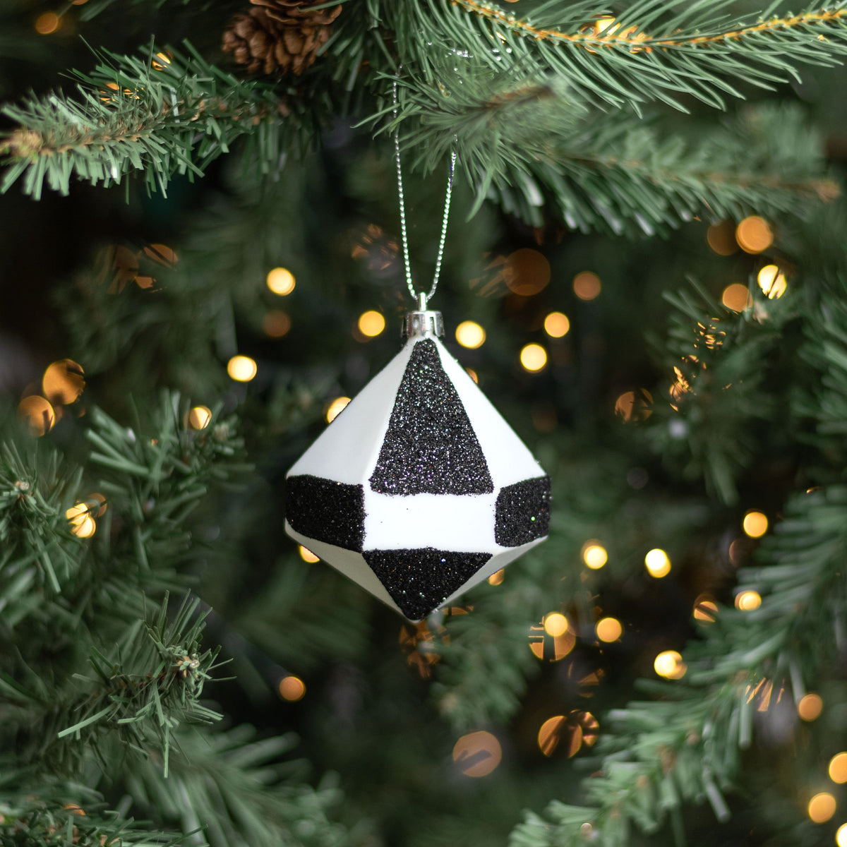 [IMPERFECT] 3" Glittered Diamond Ornament: Black & White Lifestyle Photo