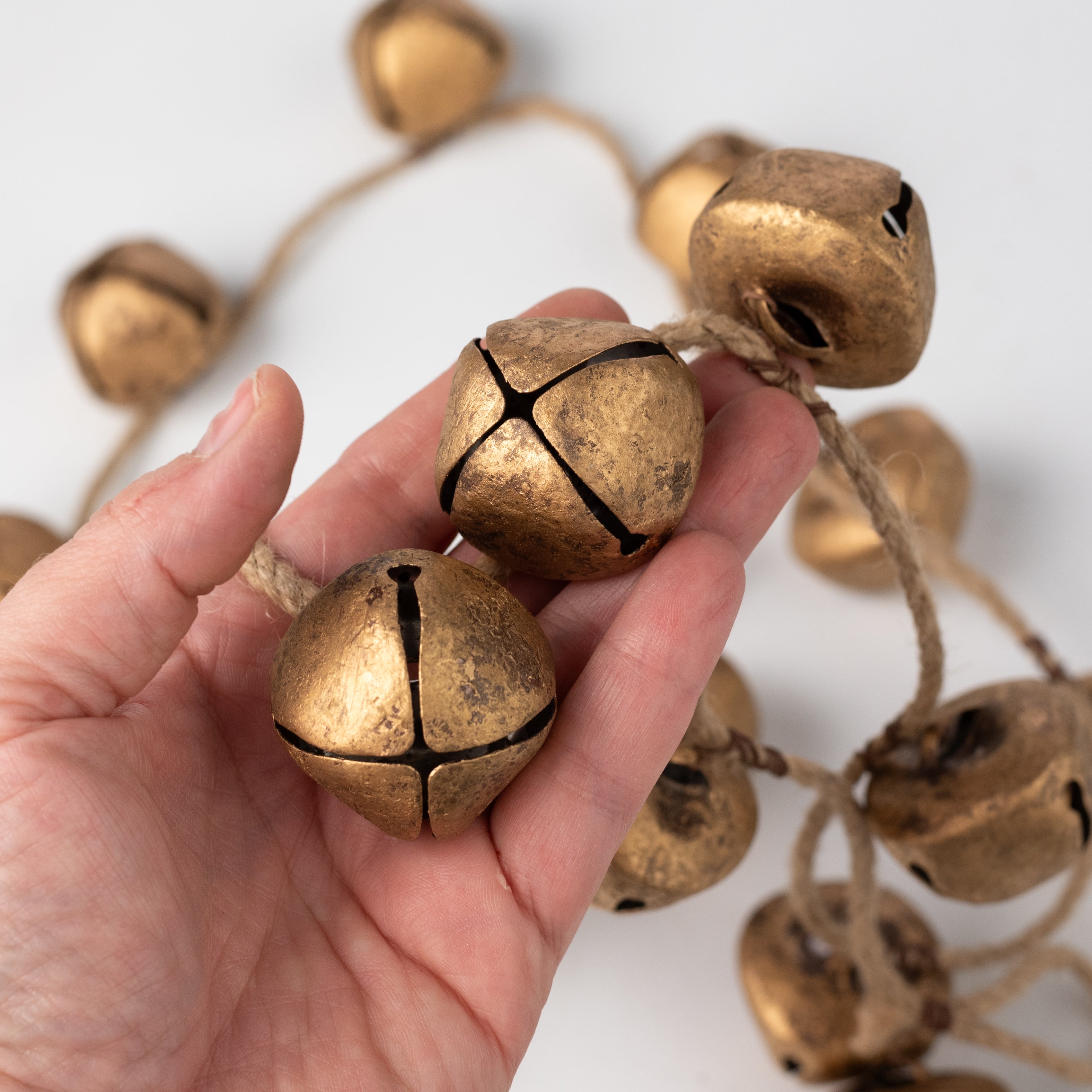 60" Jingle Bell Garland: Antique Gold detail photo 3