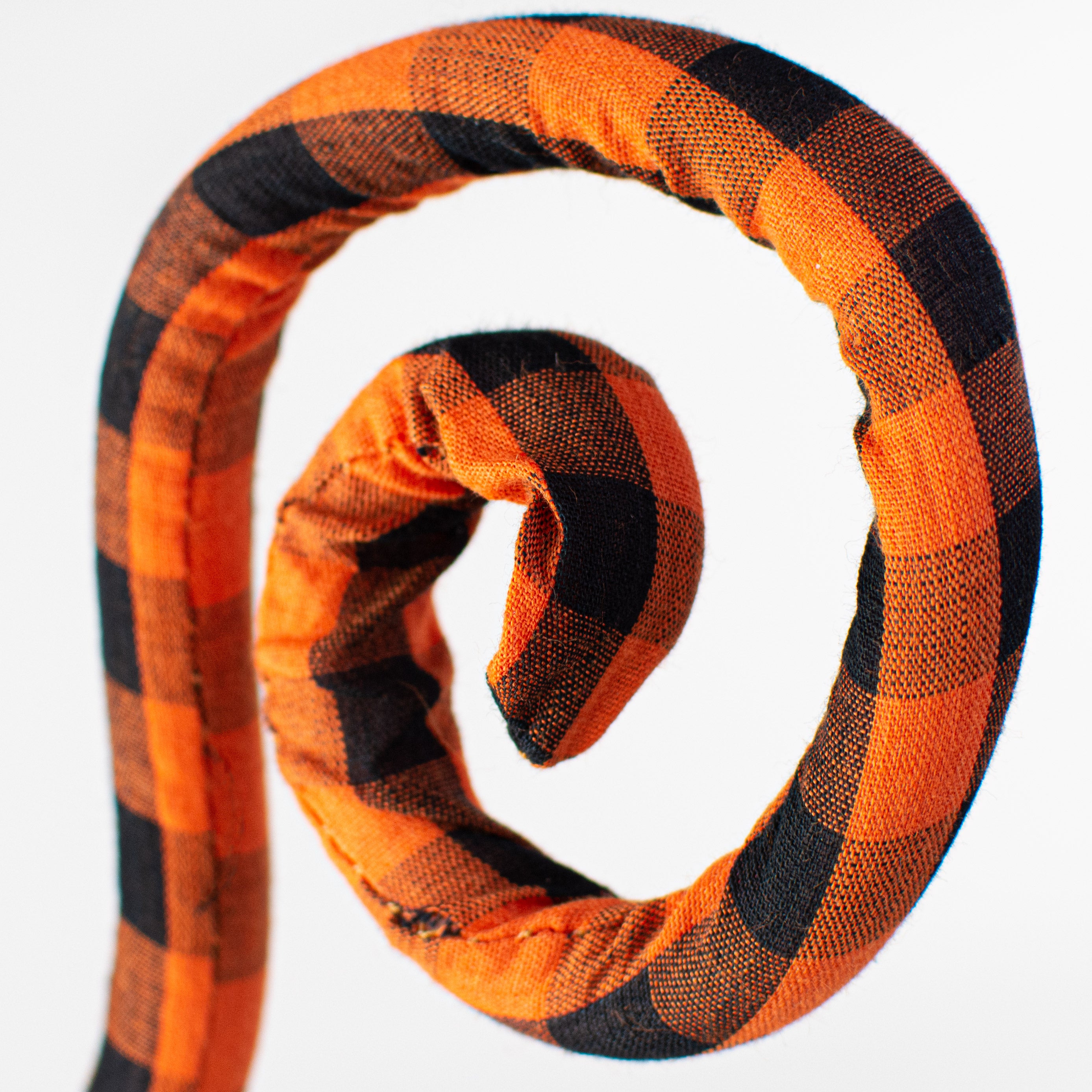 30" Knit Fabric Plaid Spiral Curly Spray: Orange & Black Lifestyle Photo