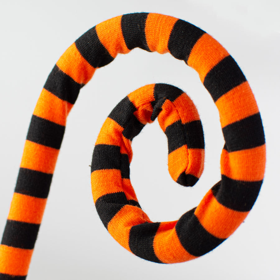 30" Knit Fabric Stripe Spiral Curly Spray: Orange & Black Lifestyle Photo