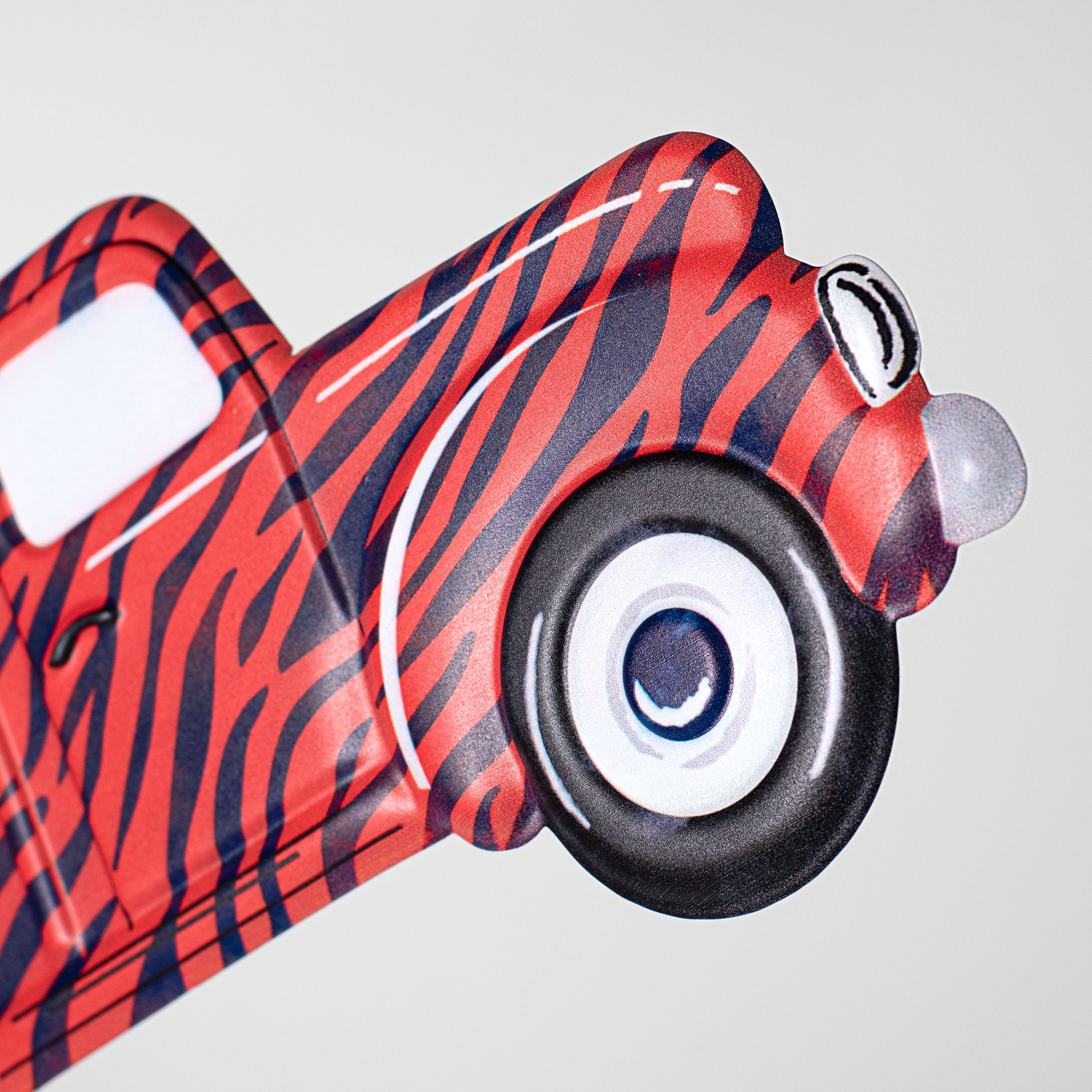 12" Metal Embossed Hanger: Navy & Orange Animal Stripe Truck detail photo 3