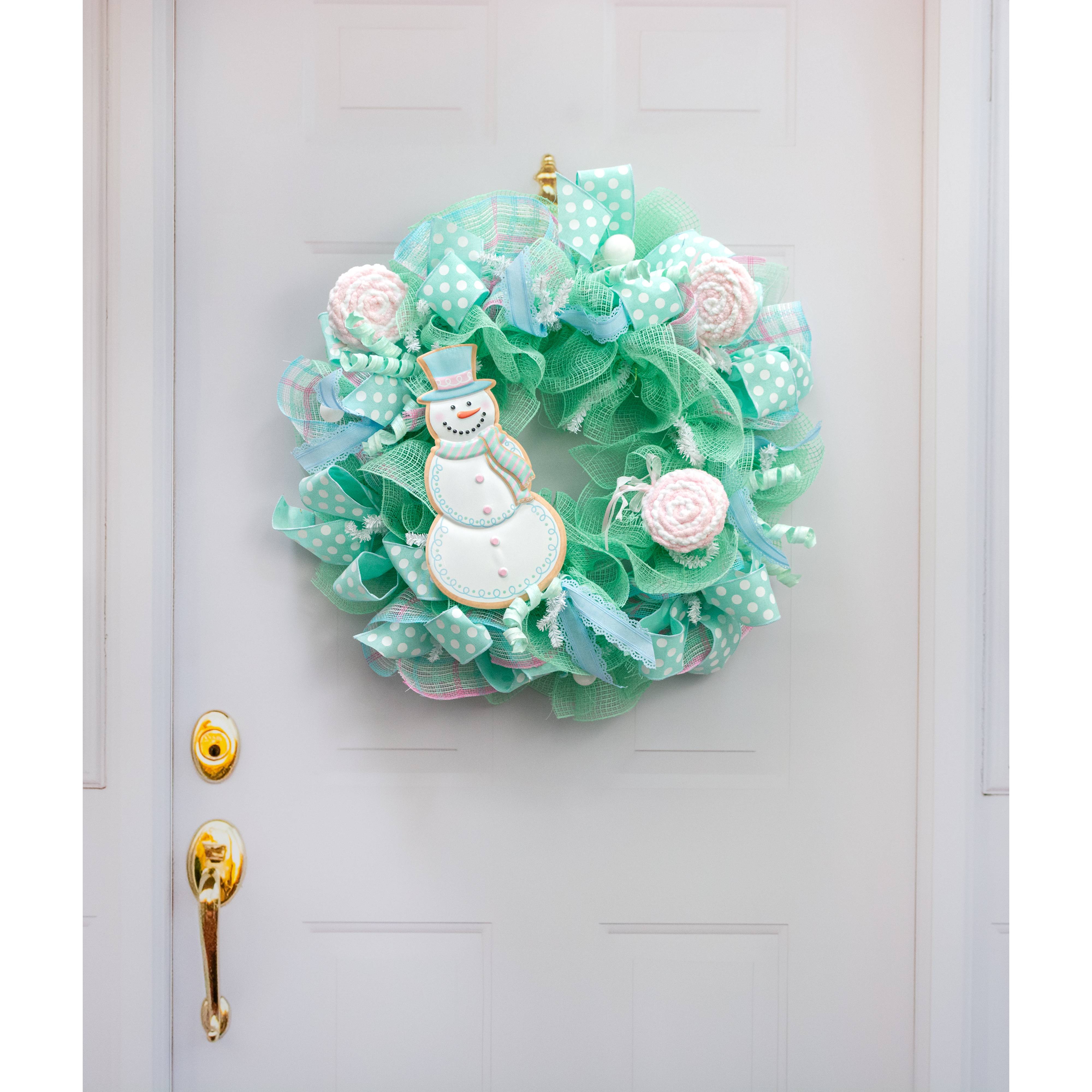 12" Metal Embossed Hanger: Snowman Cookie Pink & Blue Lifestyle Photo
