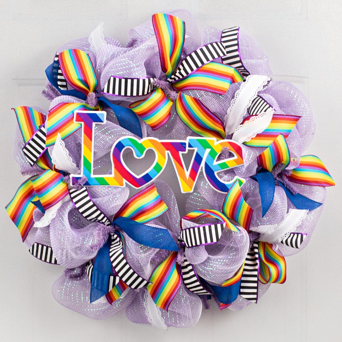 13" Metal Embossed Sign: Rainbow Love Lifestyle Photo