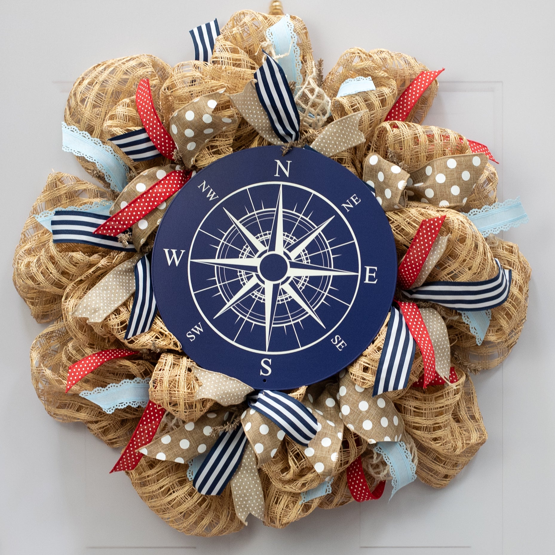 12" Metal Sign: Nautical Compass Lifestyle Photo