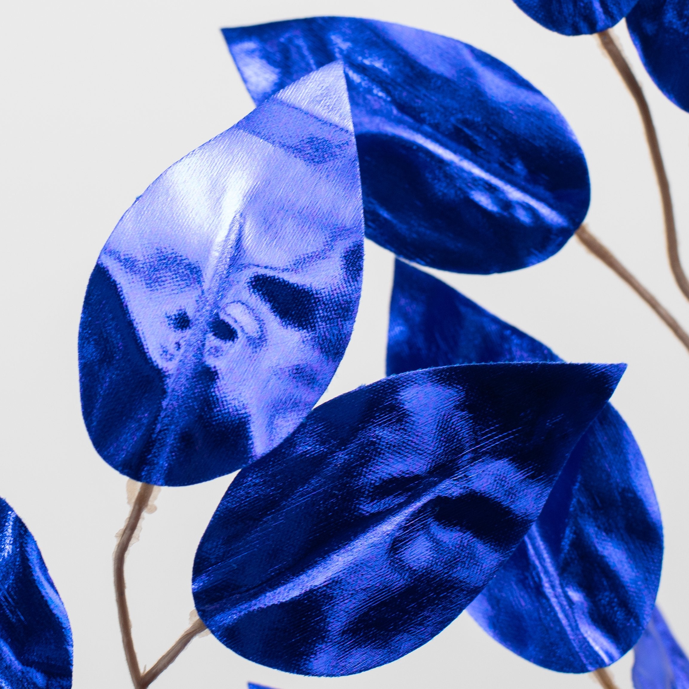 23" Metallic Ficus Leaf Spray: Royal Blue (12) Lifestyle Photo