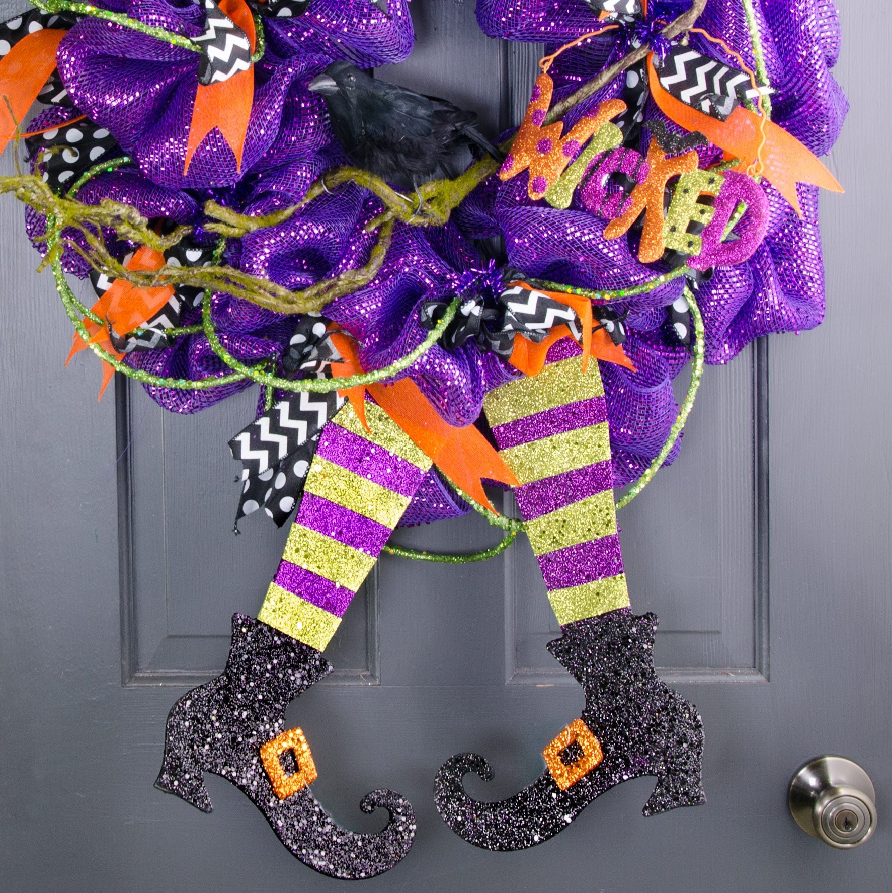 16" Metallic Foam Glittered Witch Leg Pair: Purple & Green Lifestyle Photo