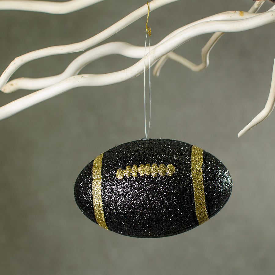 4.5" Metallic Glitter Football Ornament: Black & Gold Lifestyle Photo