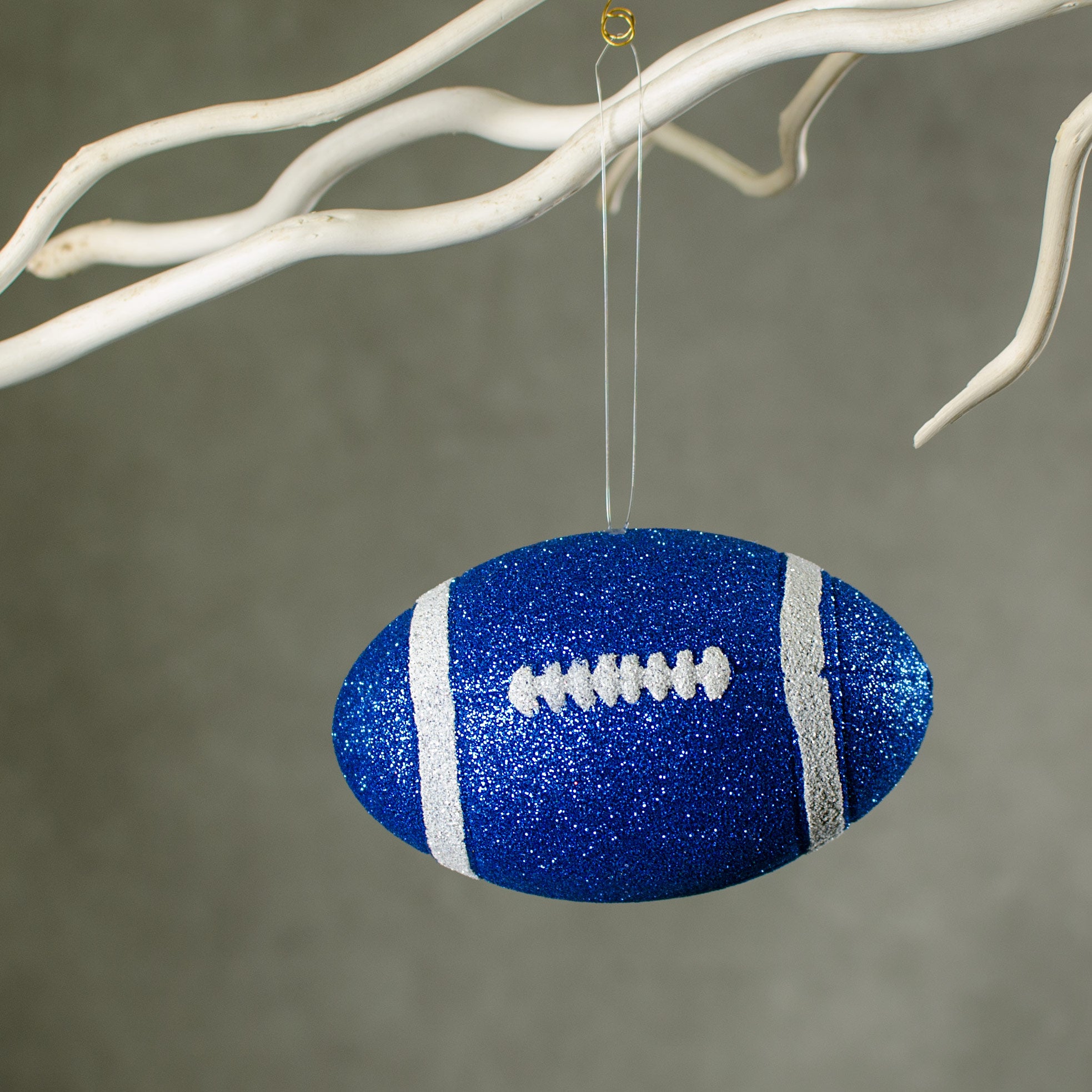 4.5" Metallic Glitter Football Ornament: Blue & White Lifestyle Photo