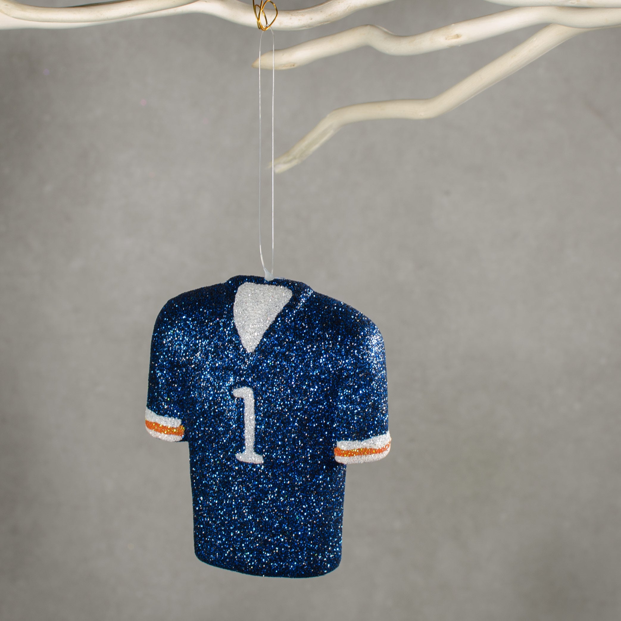 4.5" Metallic Glittered Football Jersey Ornament: Navy Blue, Orange & White Lifestyle Photo