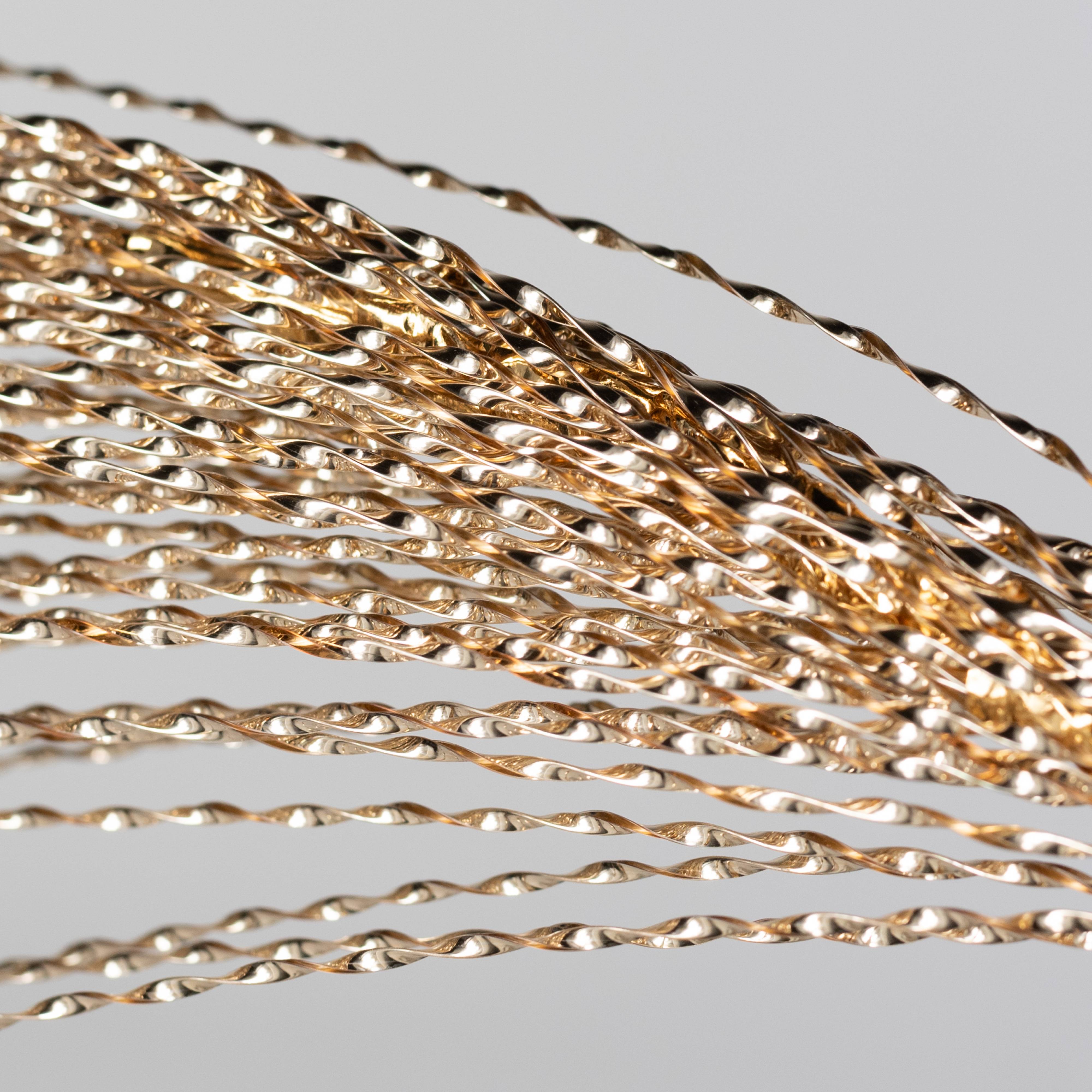 32" Metallic Twisted Grass Spray: Gold Lifestyle Photo
