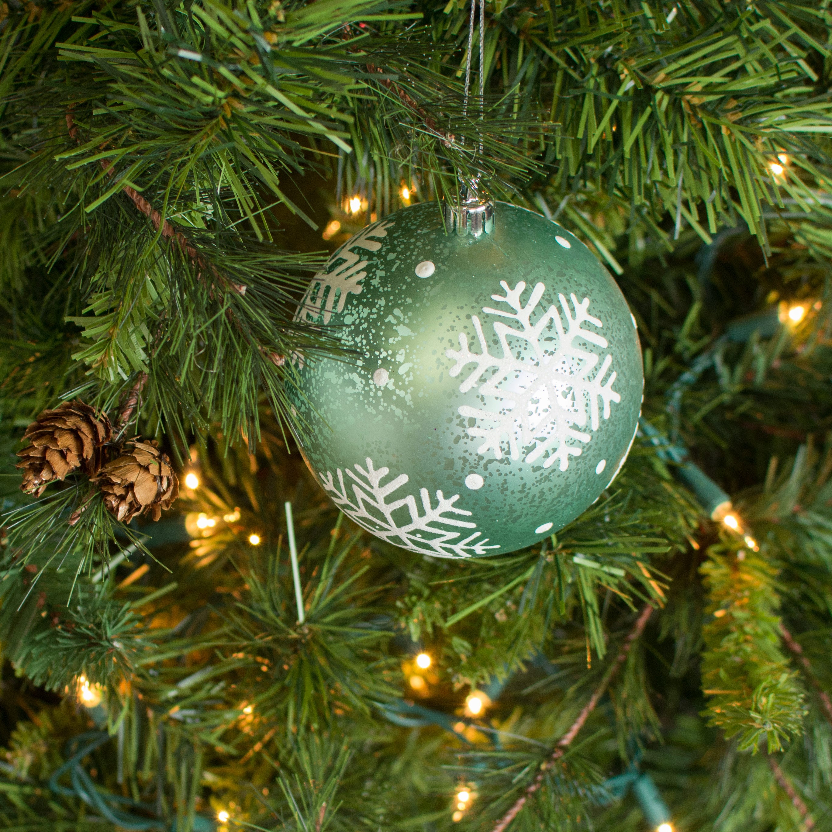 100MM Antique Look Snowflake Ball: Ice Blue Lifestyle Photo