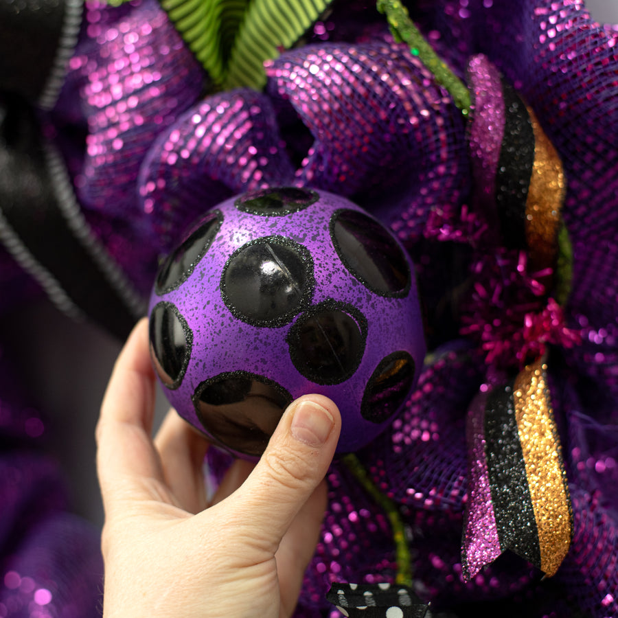 100mm Antiqued Dots Ornament: Purple & Black Lifestyle Photo