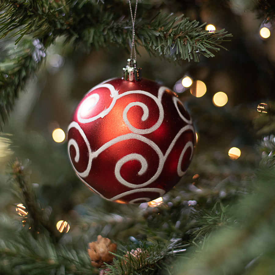 100MM Glitter Scroll Swirl Ball: Matte Red & White Lifestyle Photo