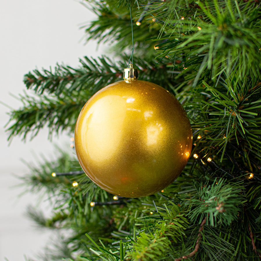 100MM Plastic Ball Ornament: Candy Apple Gold (Set of 4) Lifestyle Photo