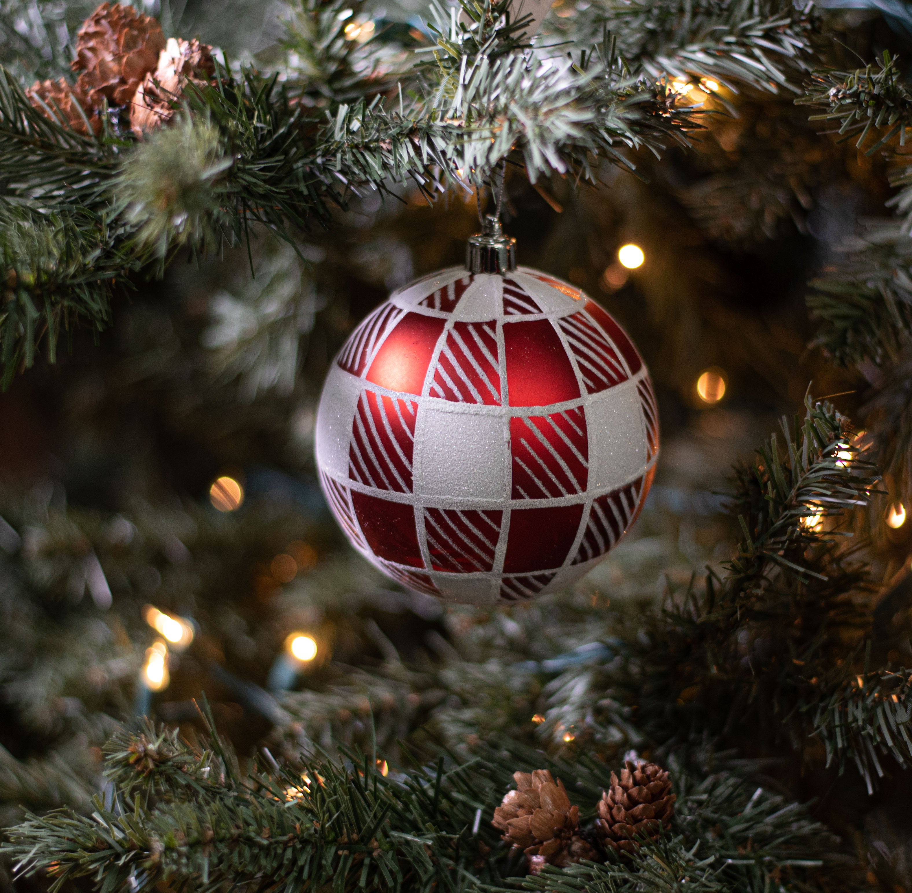 100MM Striped Check Ball Ornament: Red & White Lifestyle Photo