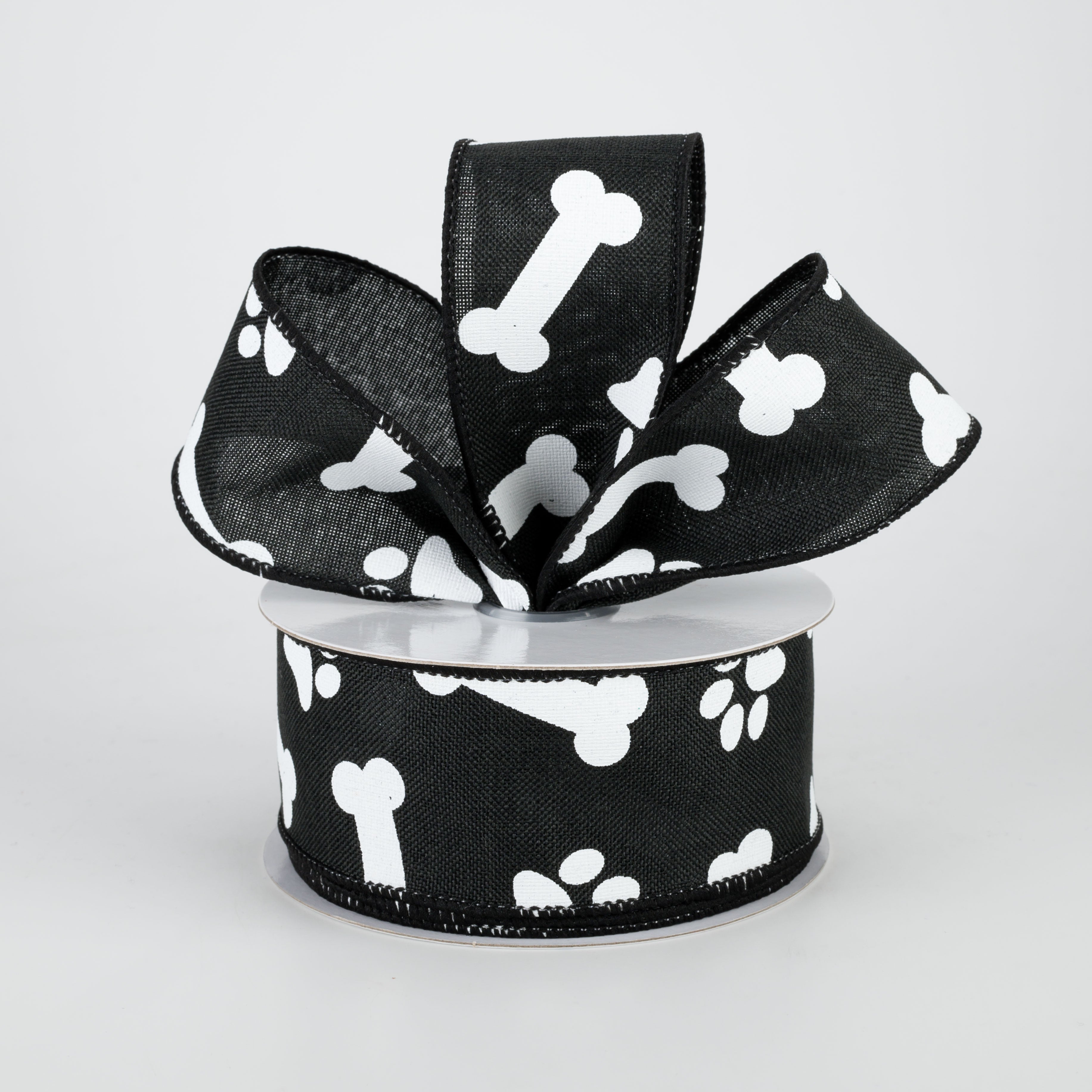 1.5" Paw Print & Bones Ribbon: Black & White (10 Yards) Lifestyle Photo